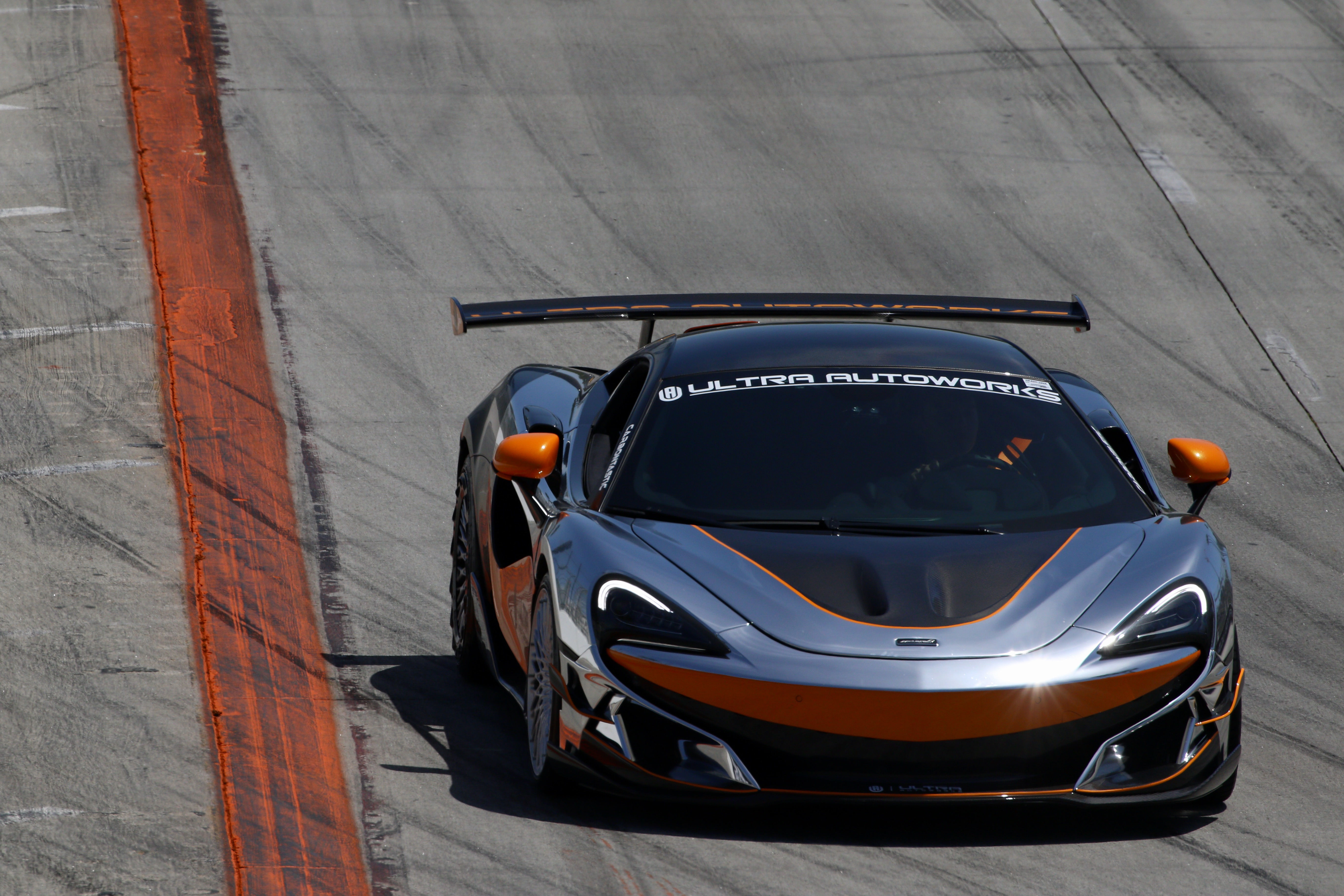 An exotic car rides the circuit in the Mornings CARnival...