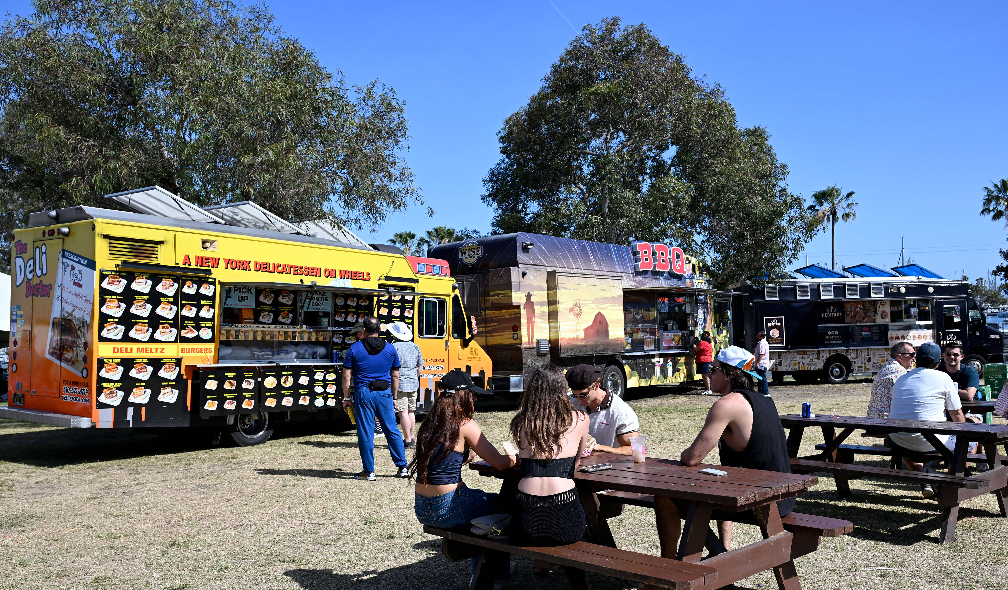 Race fans relax at the food trucks during the 51st...