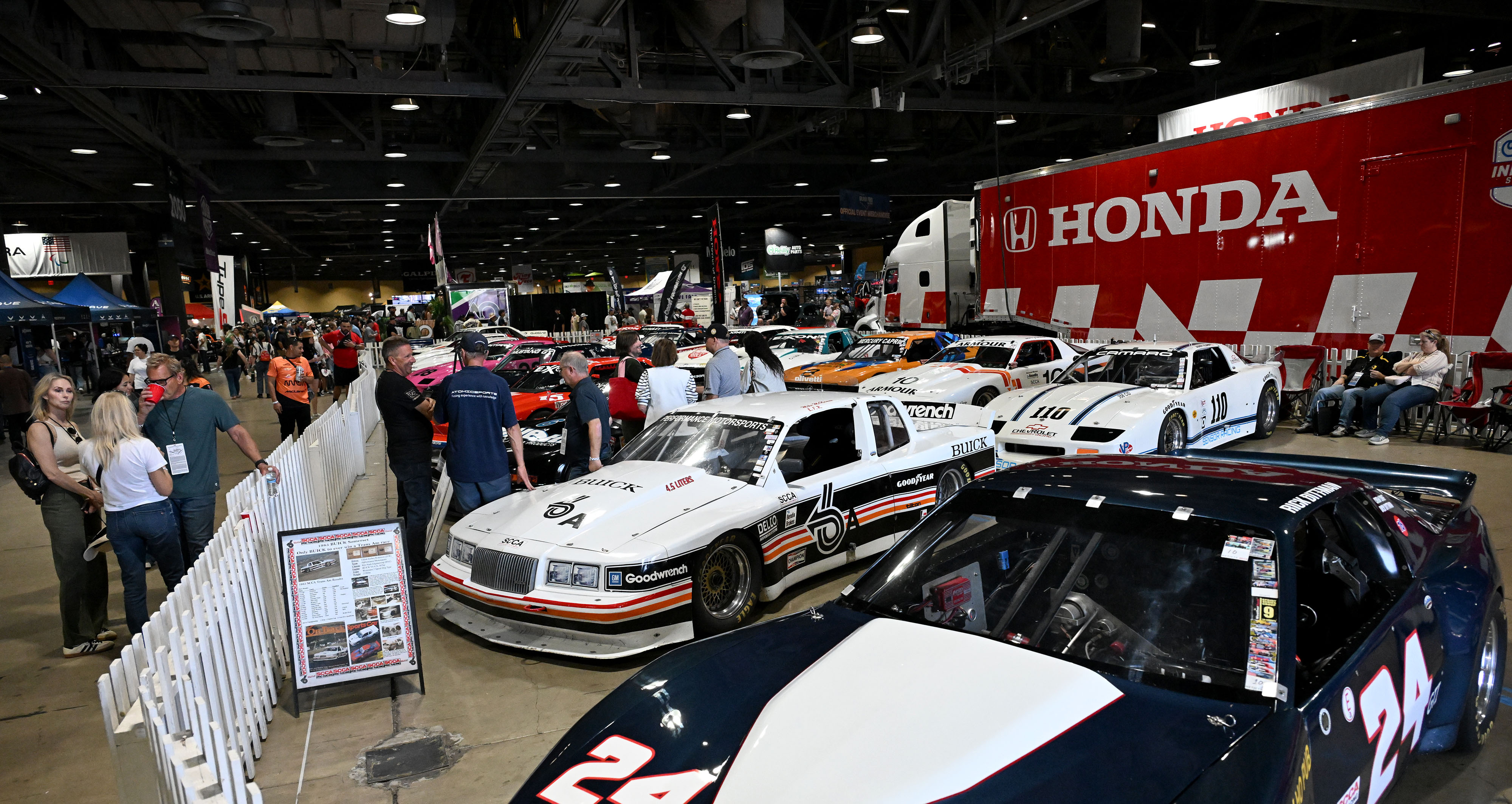 Race cars on display in the Lifestyle and Expo Center...