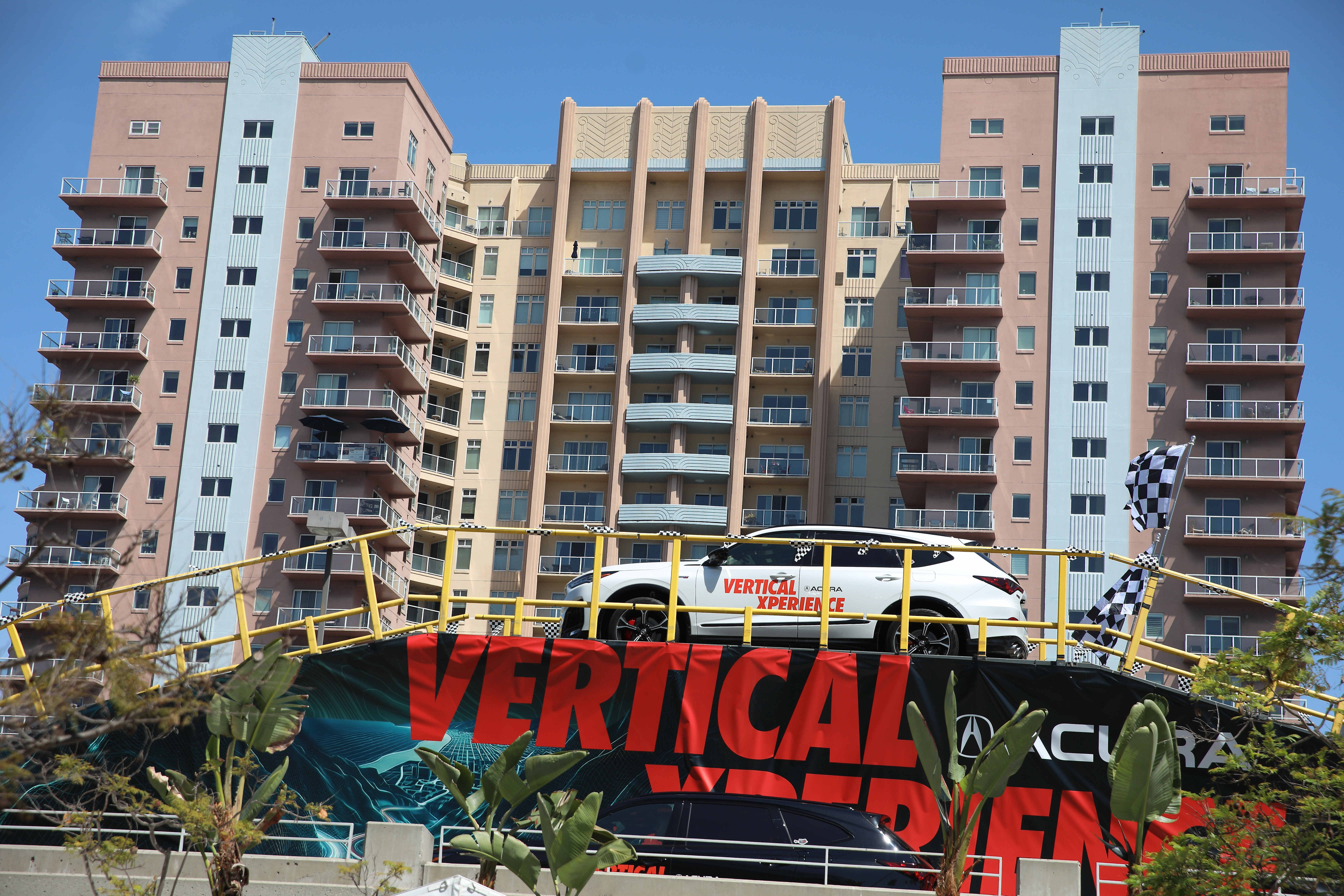 An interactive Acura experience sits on top of a parking...