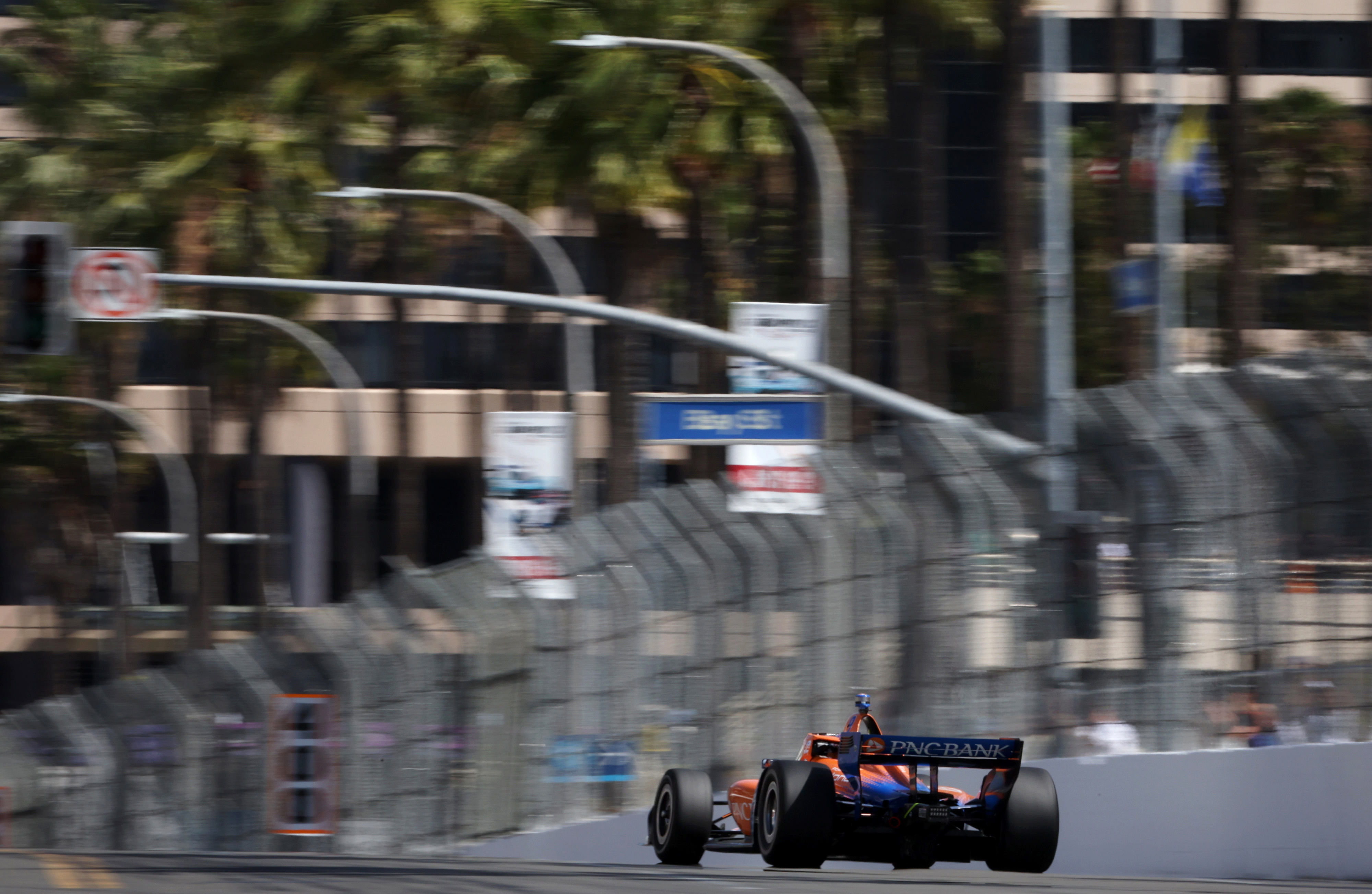 Indycar driver Scott Dixon warms up on track before the...