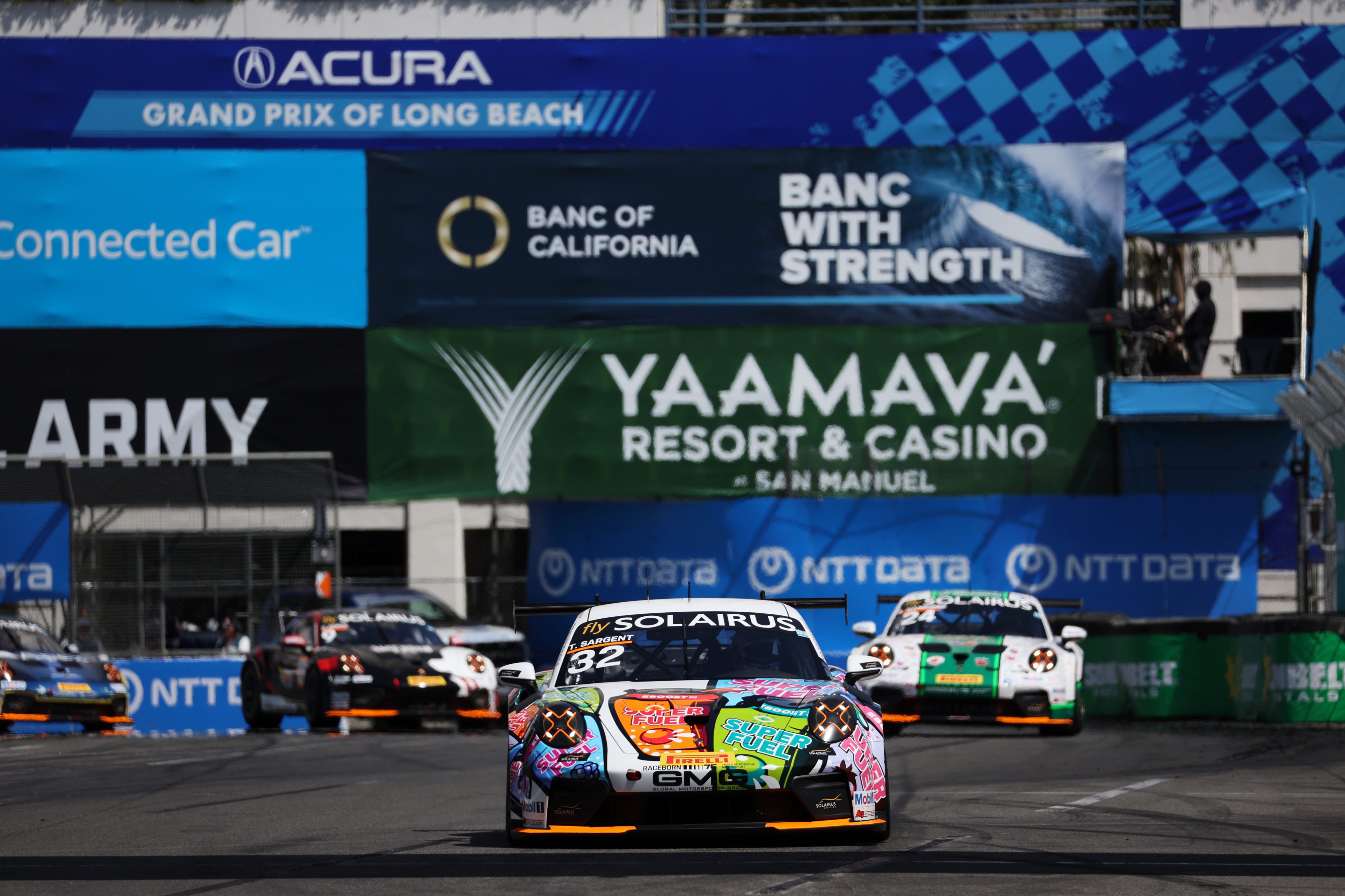 Porsche Carrera Cup North America driver Tom Sargent (32) leads...