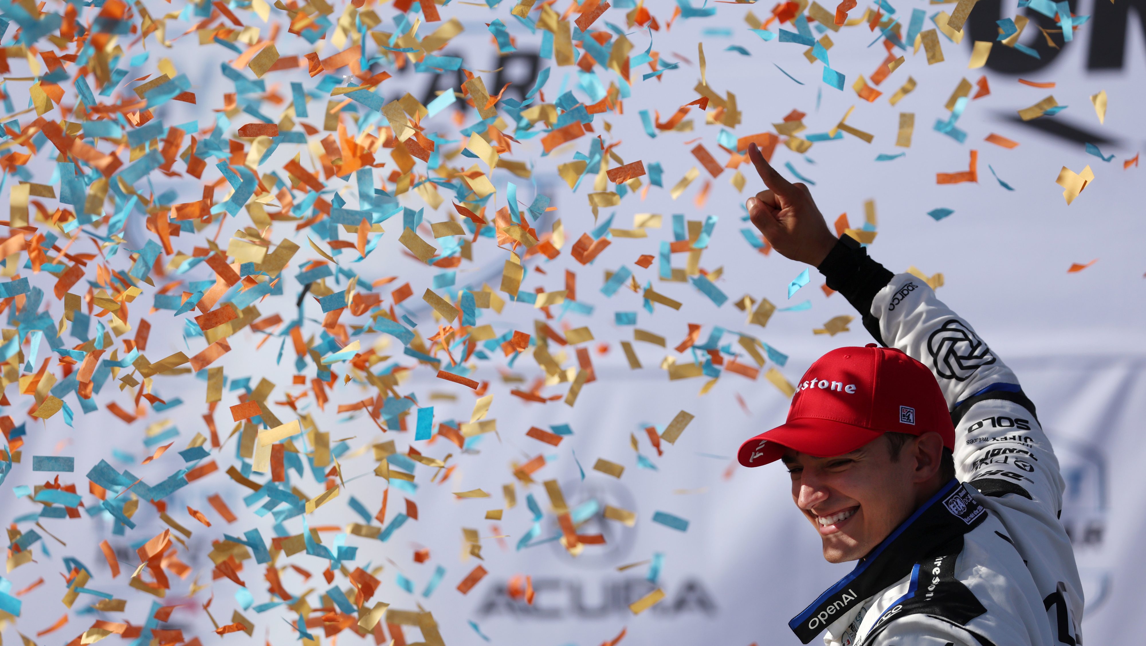 Driver Alex Palou celebrates after winning the 51st Grand Prix...