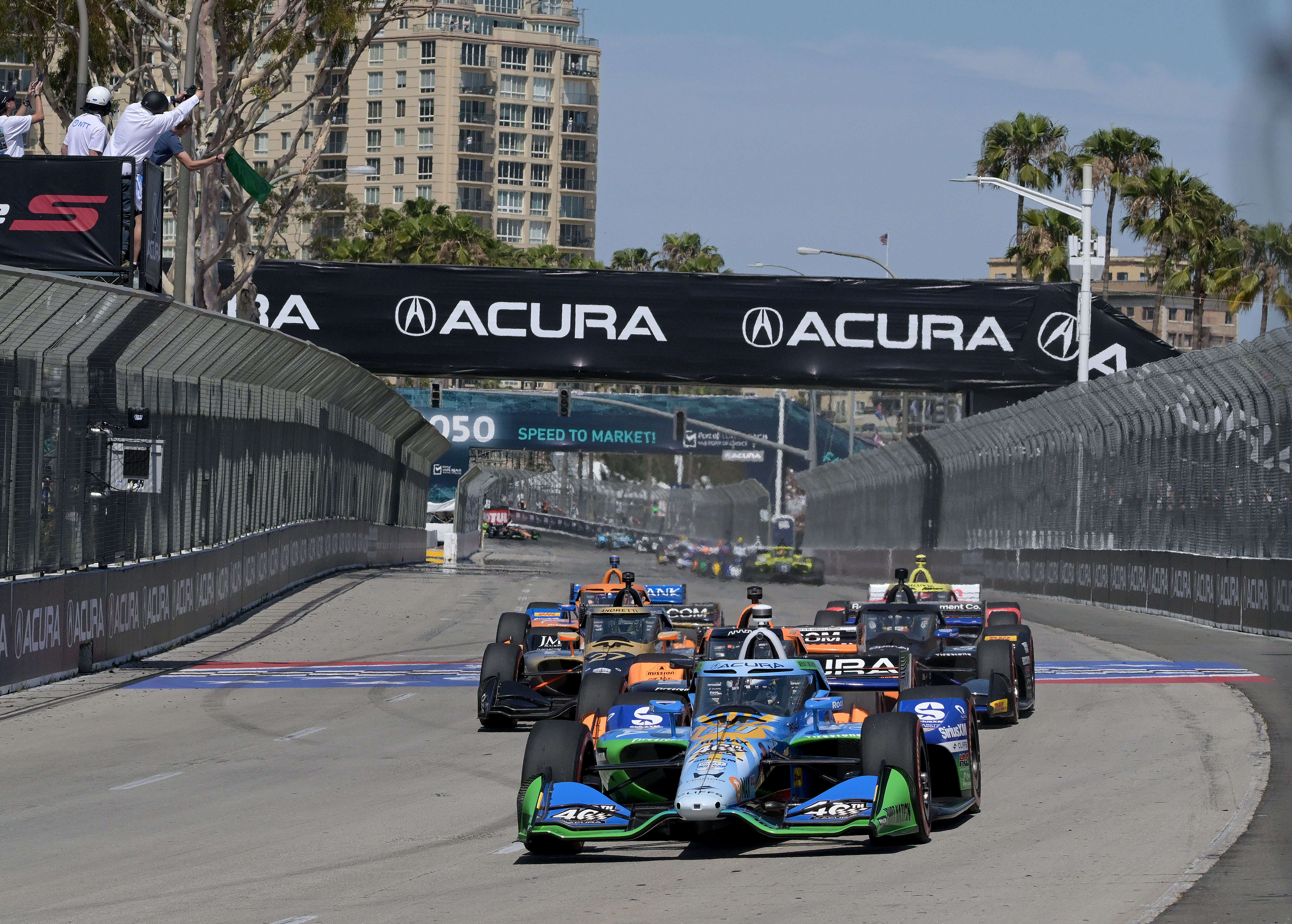 Indycar driver Felix Rosenqvist leads the field down Shoreline Drive...
