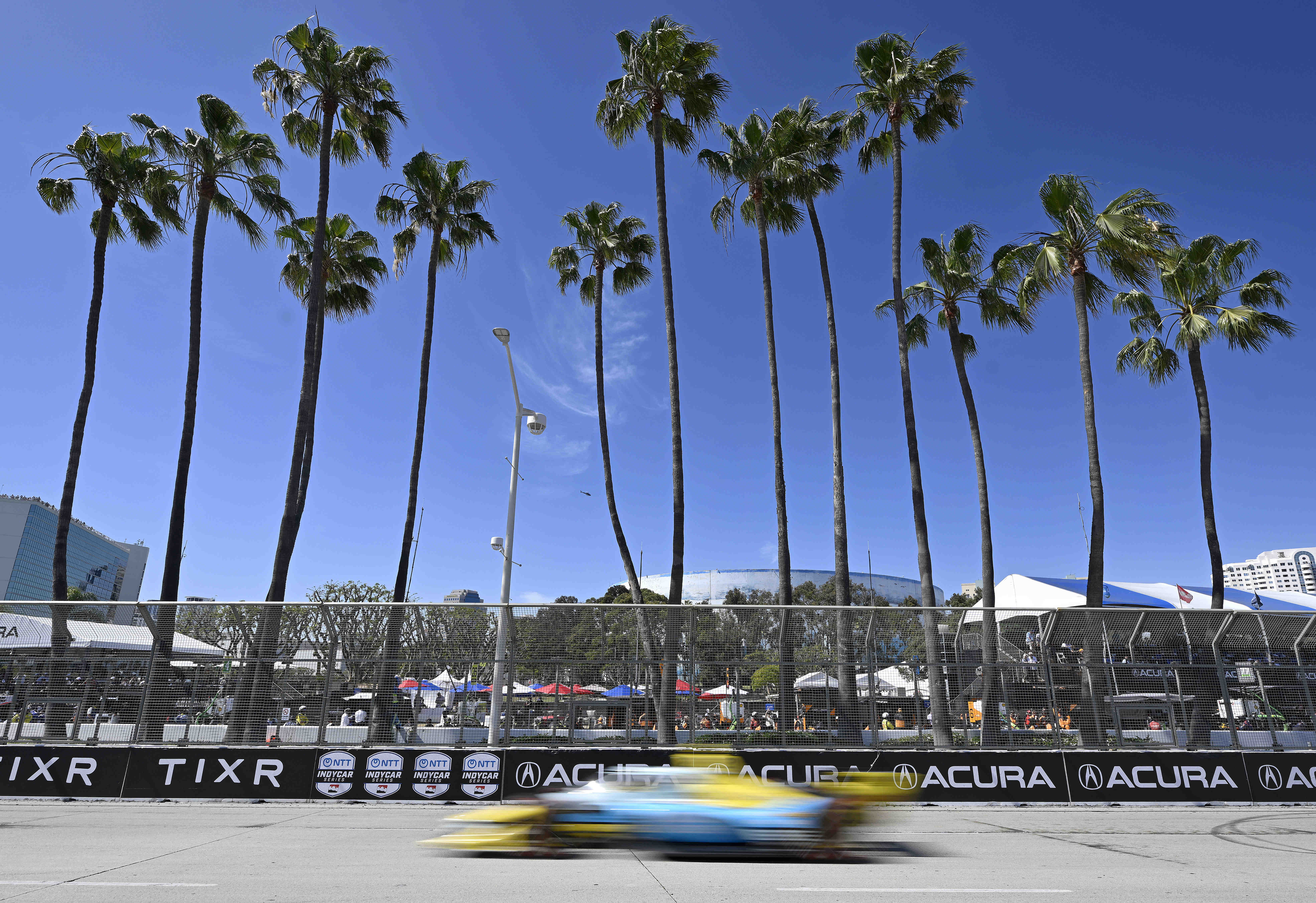 Indycar driver Christian Rasmussen races down Shoreline Drive during the...