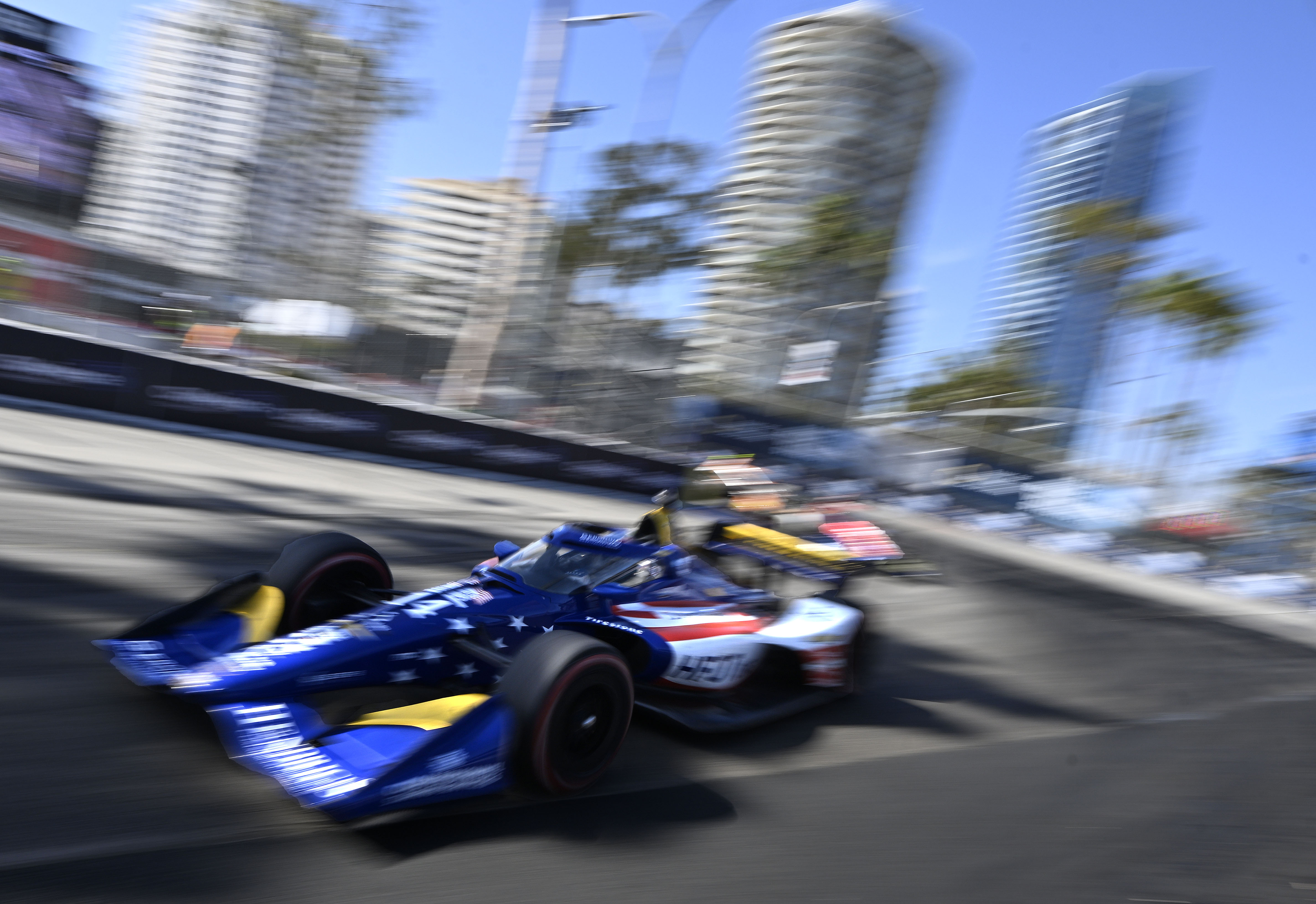 Indycar driver Santino Ferrucci exits the hairpin onto Shoreline Driver...