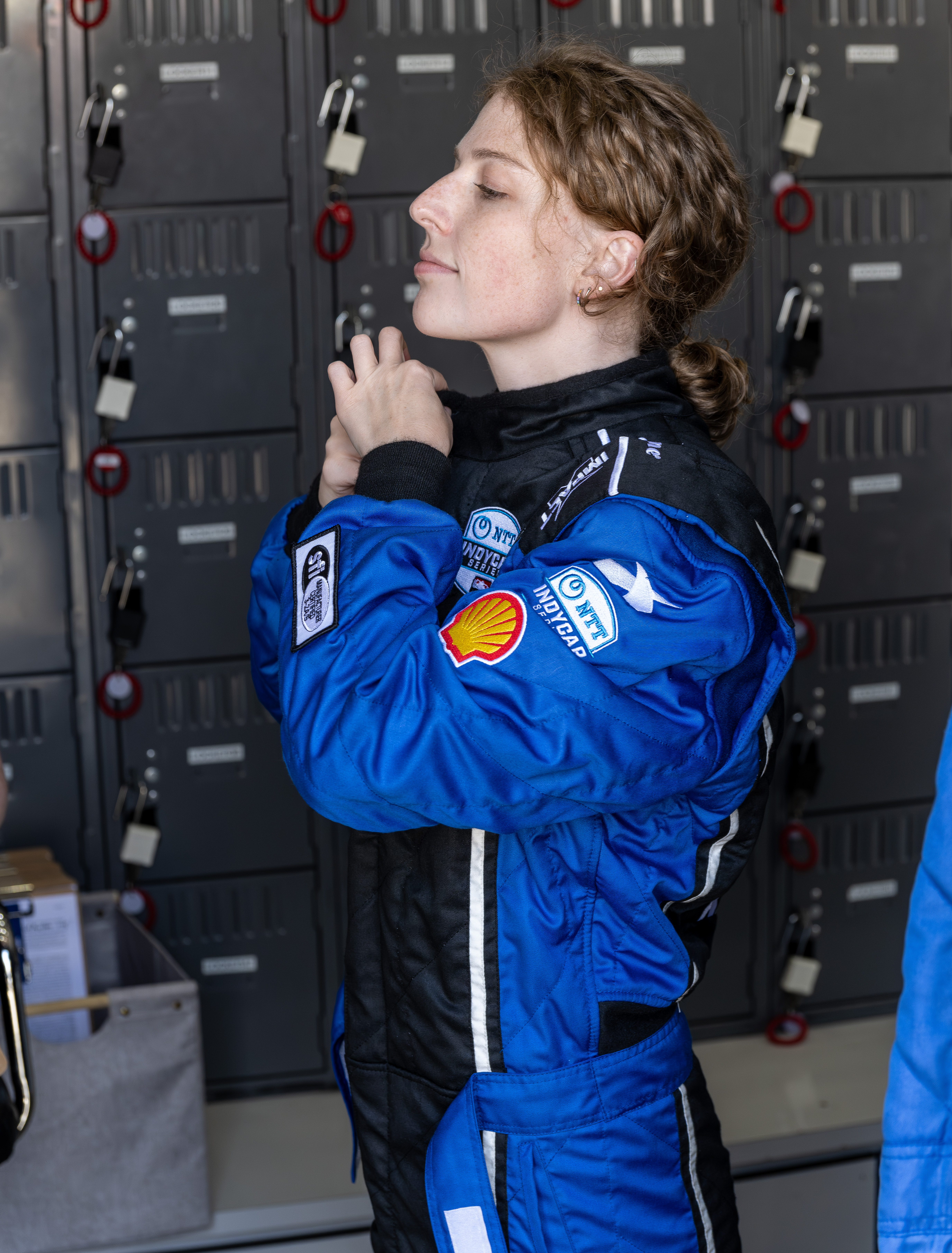Reporter Madeline Armstrong prepares for a ride-along in one of...