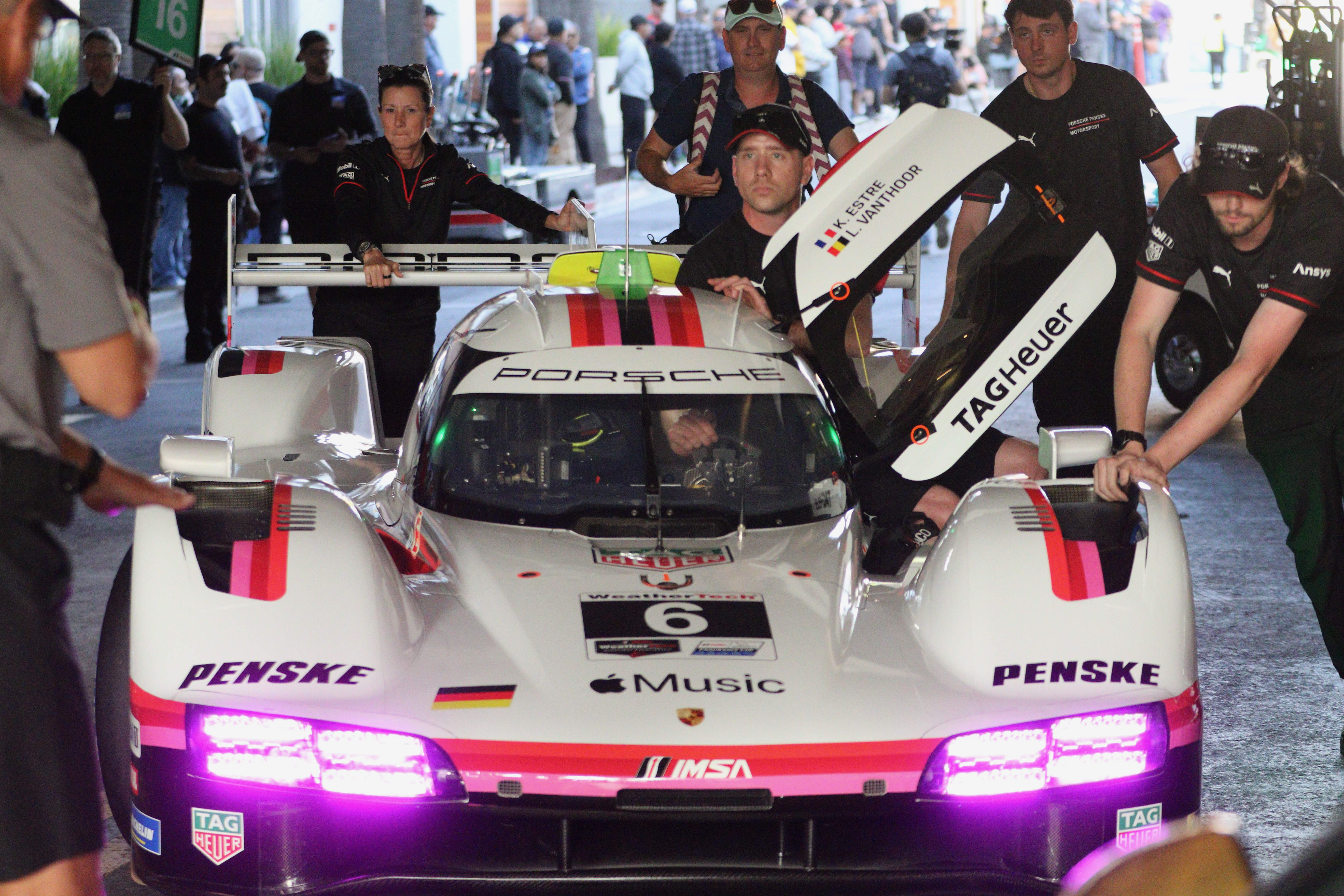 A crew positions an IMSA car for viewing at Thunder...