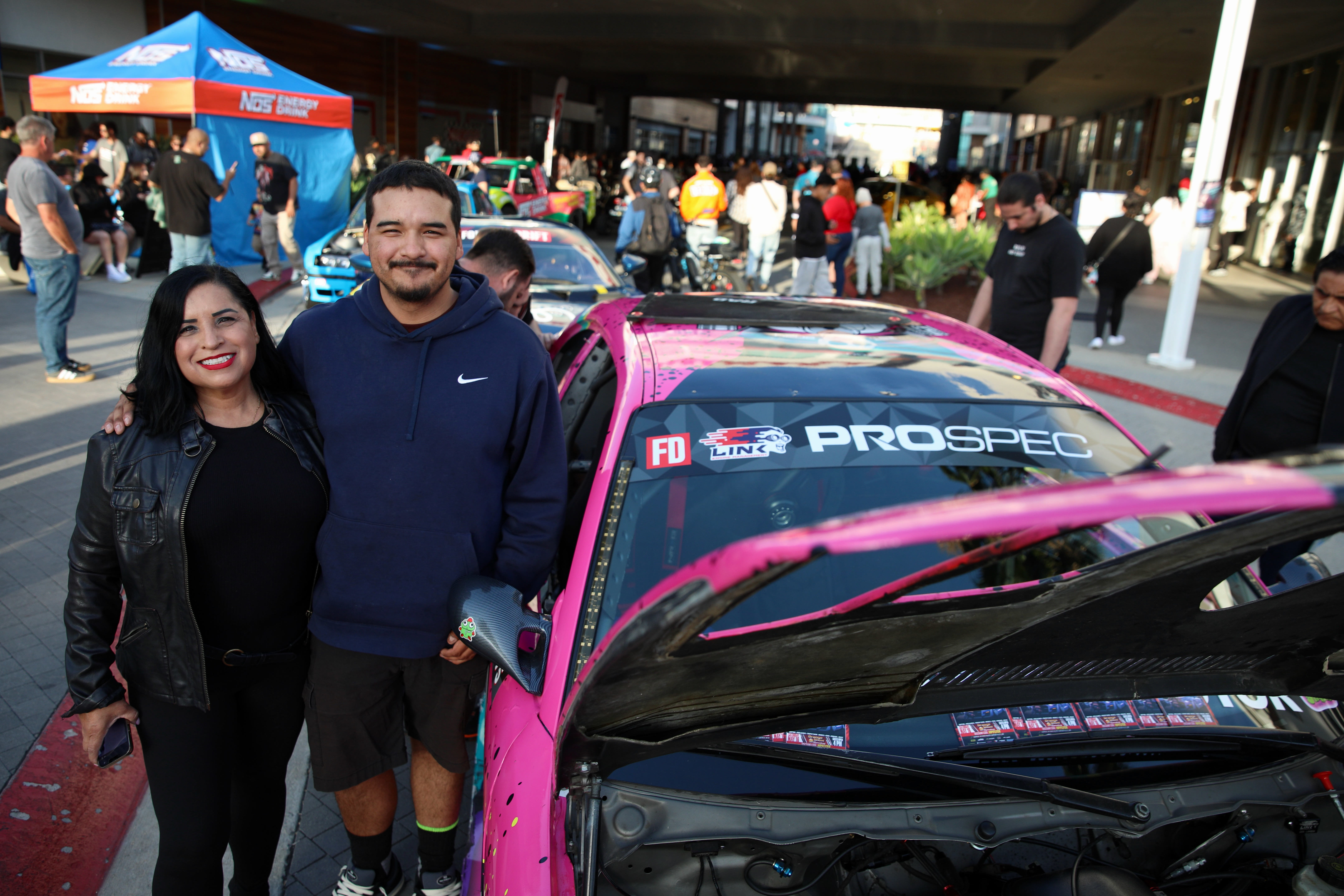 Cessy and Joey Griego of Long Beach pose with a...