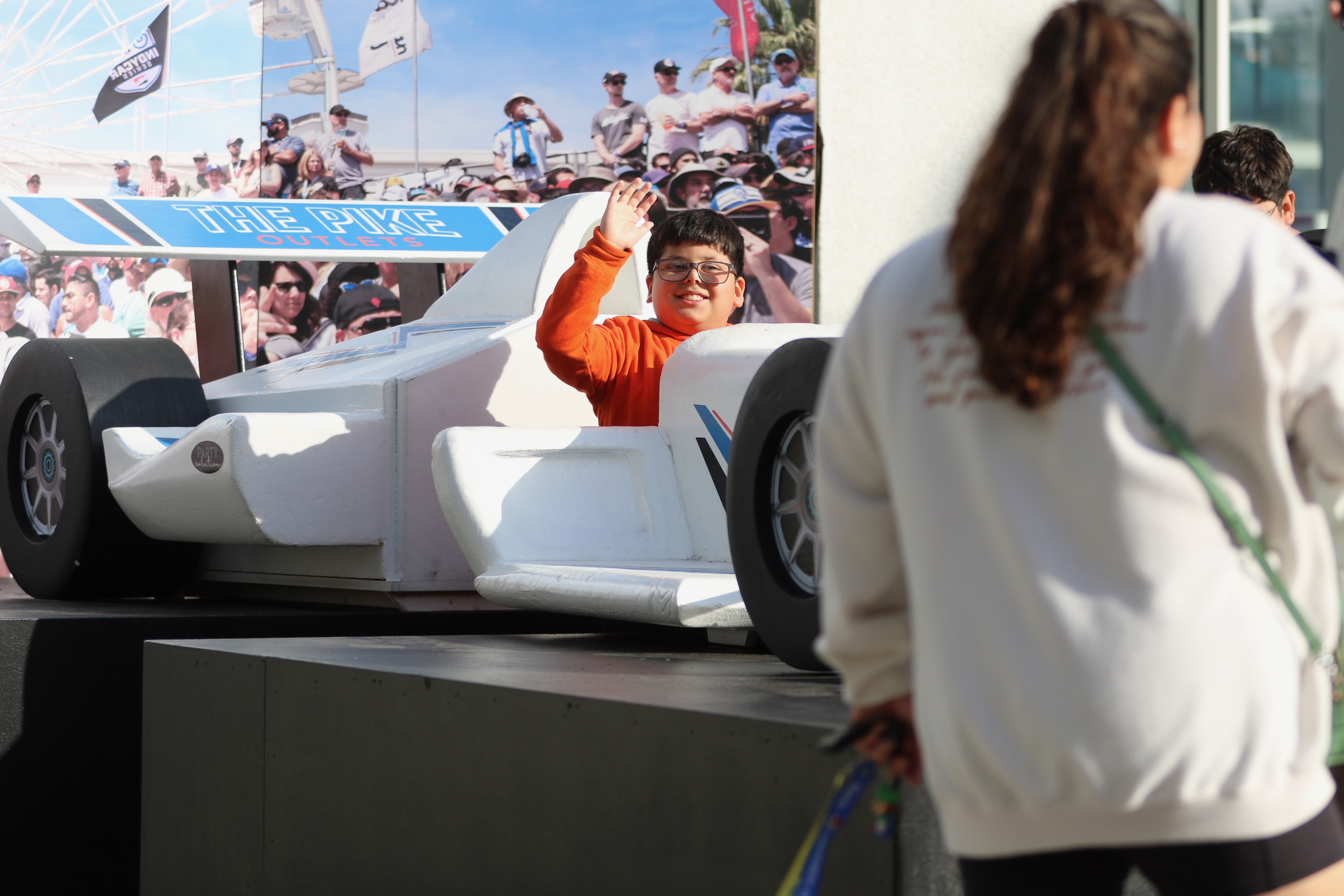 Mateo Angeles, 9, gets his picture taken inside a replica...