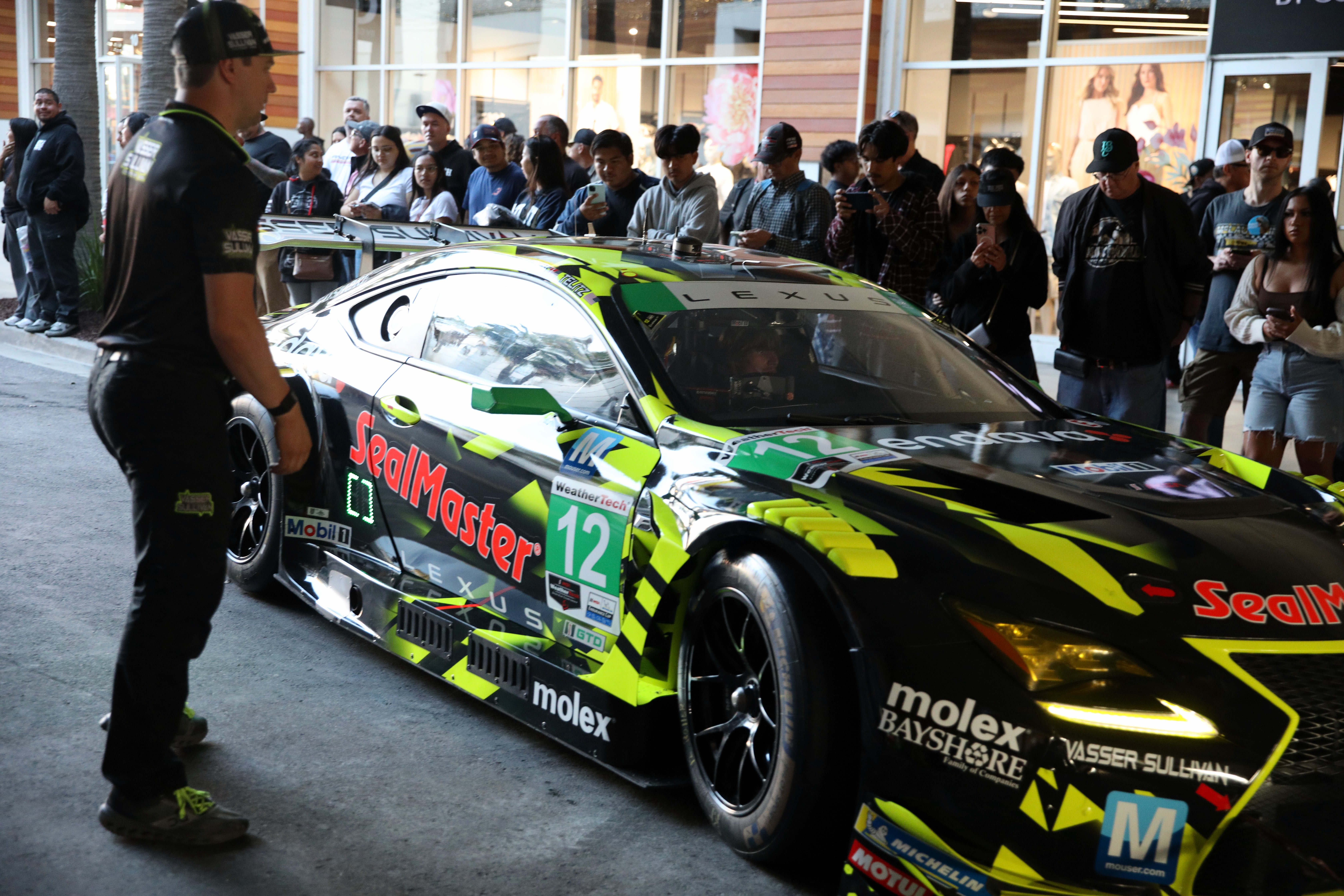 Spectators gather to meet drivers at Thunder Thursday on Thursday,...