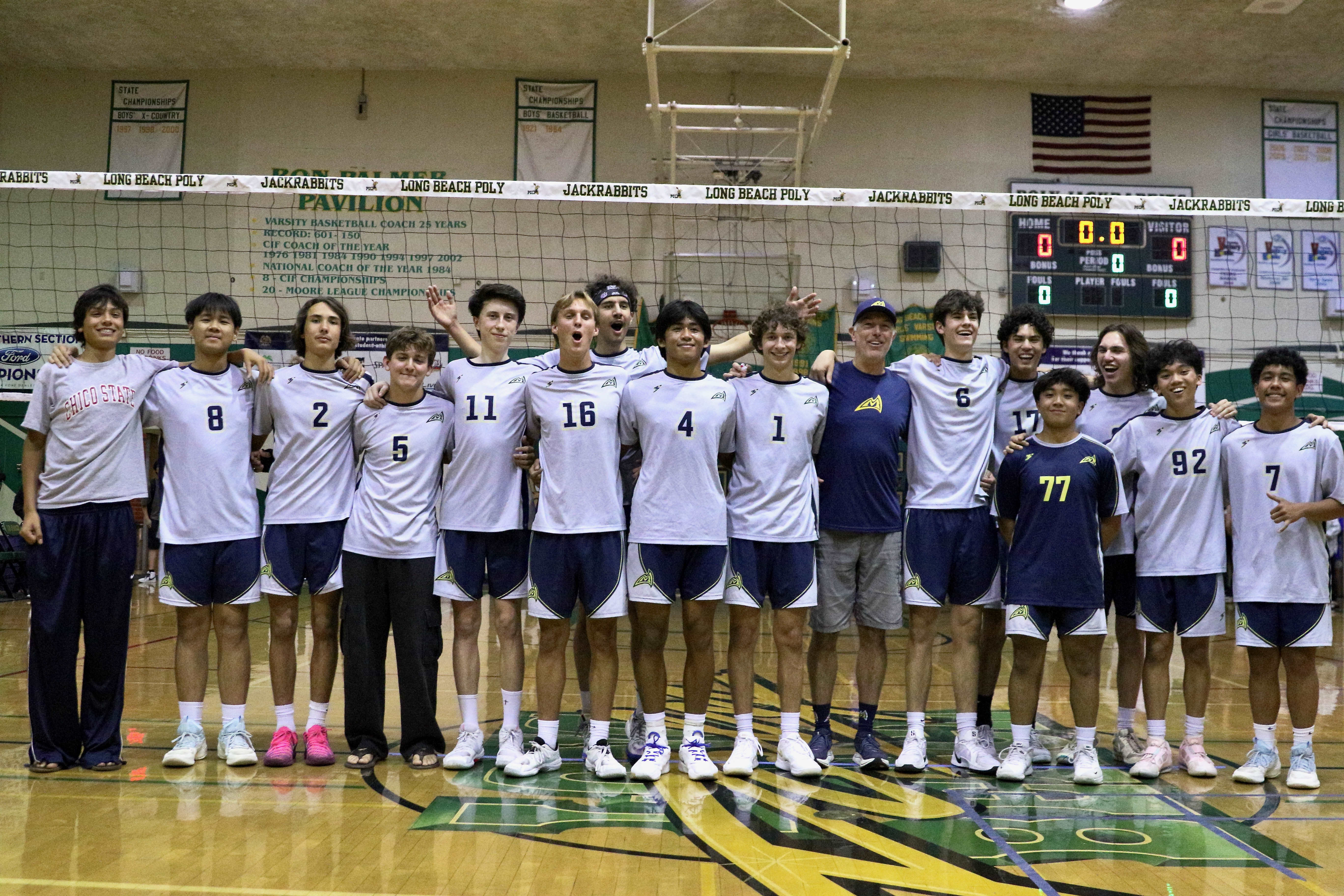 Millikan gathers for a team photo after the Rams defeated...