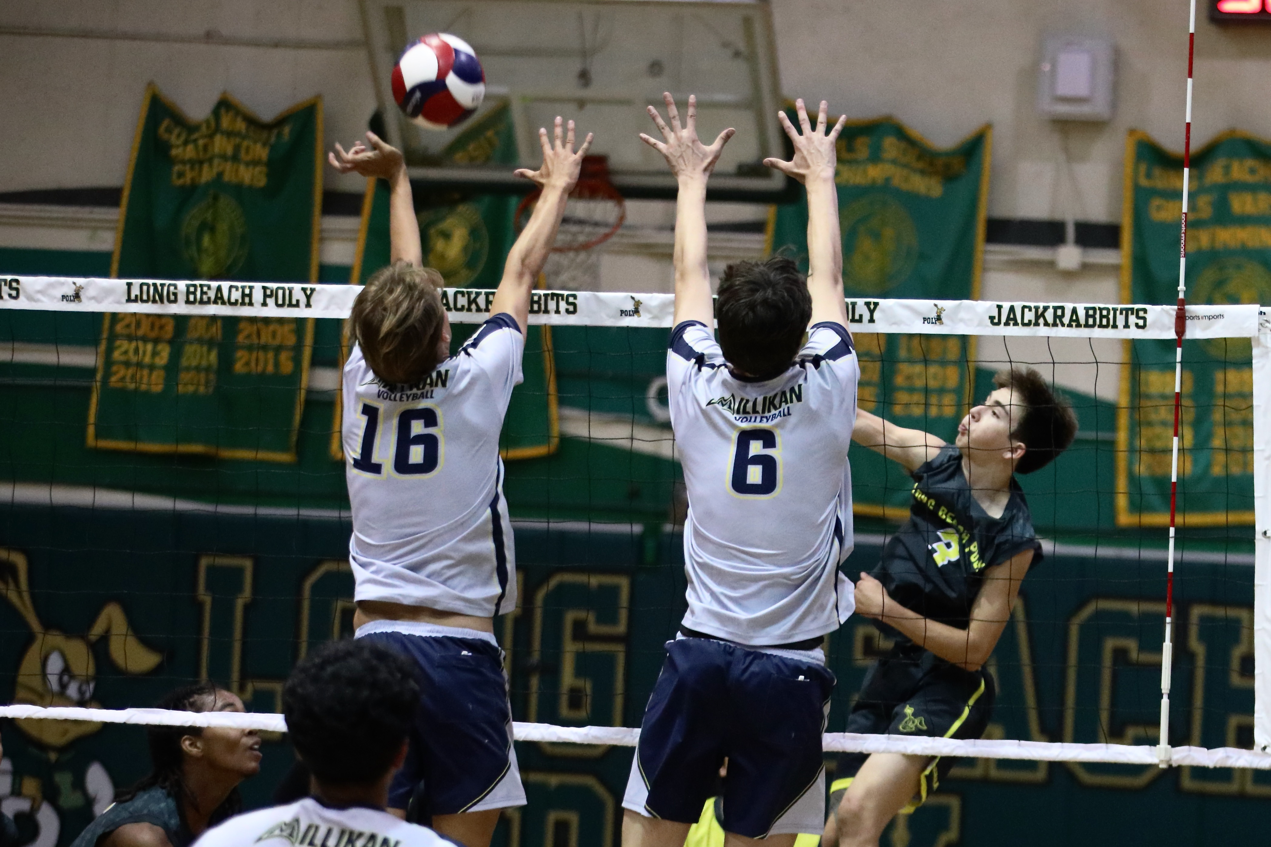 Long Beach Polyâs Nicholas Frank tries to hit the ball...