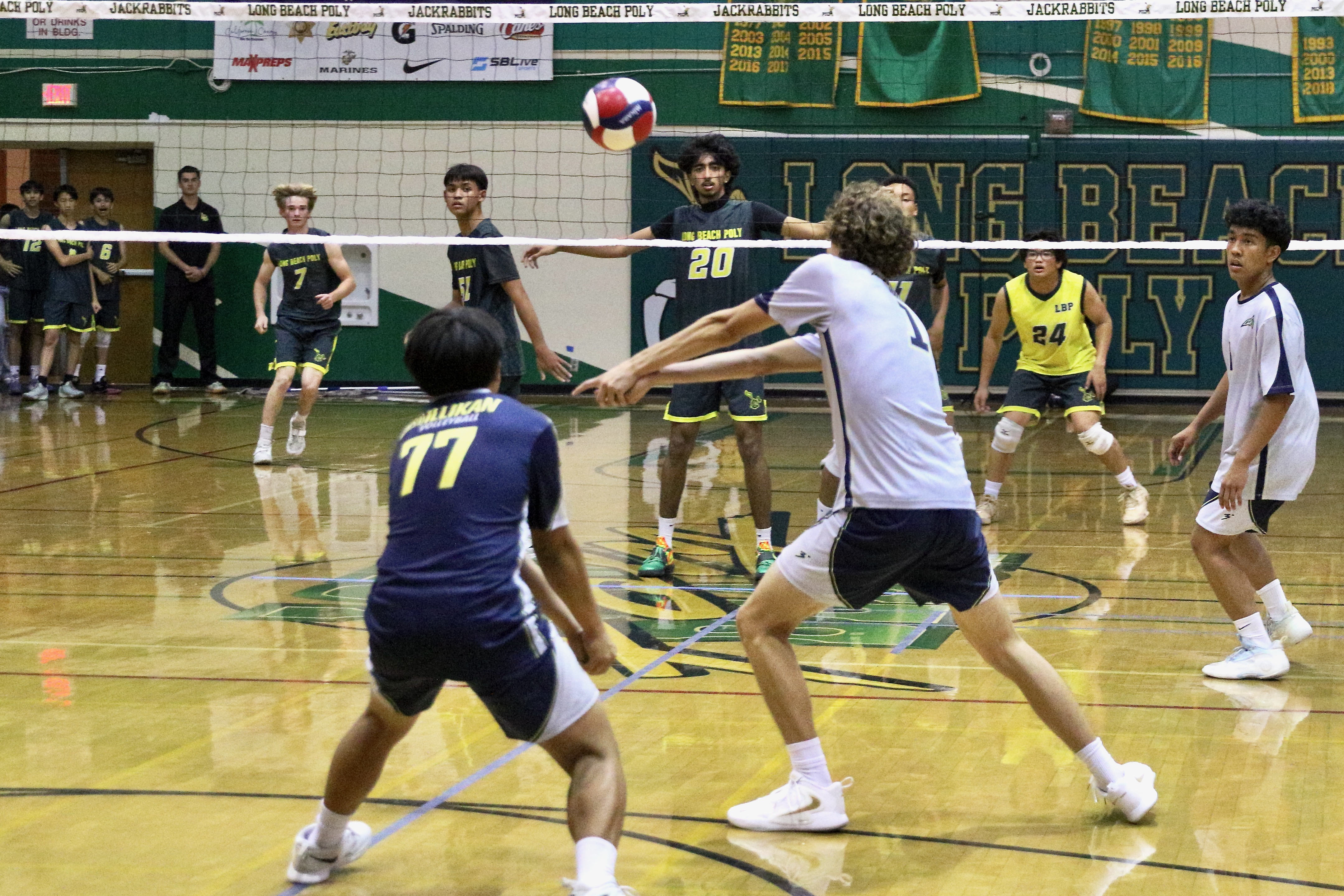Long Beach Polyâs Shahi Ifrad, #20, watches Millikanâs Jacob Karkanen...