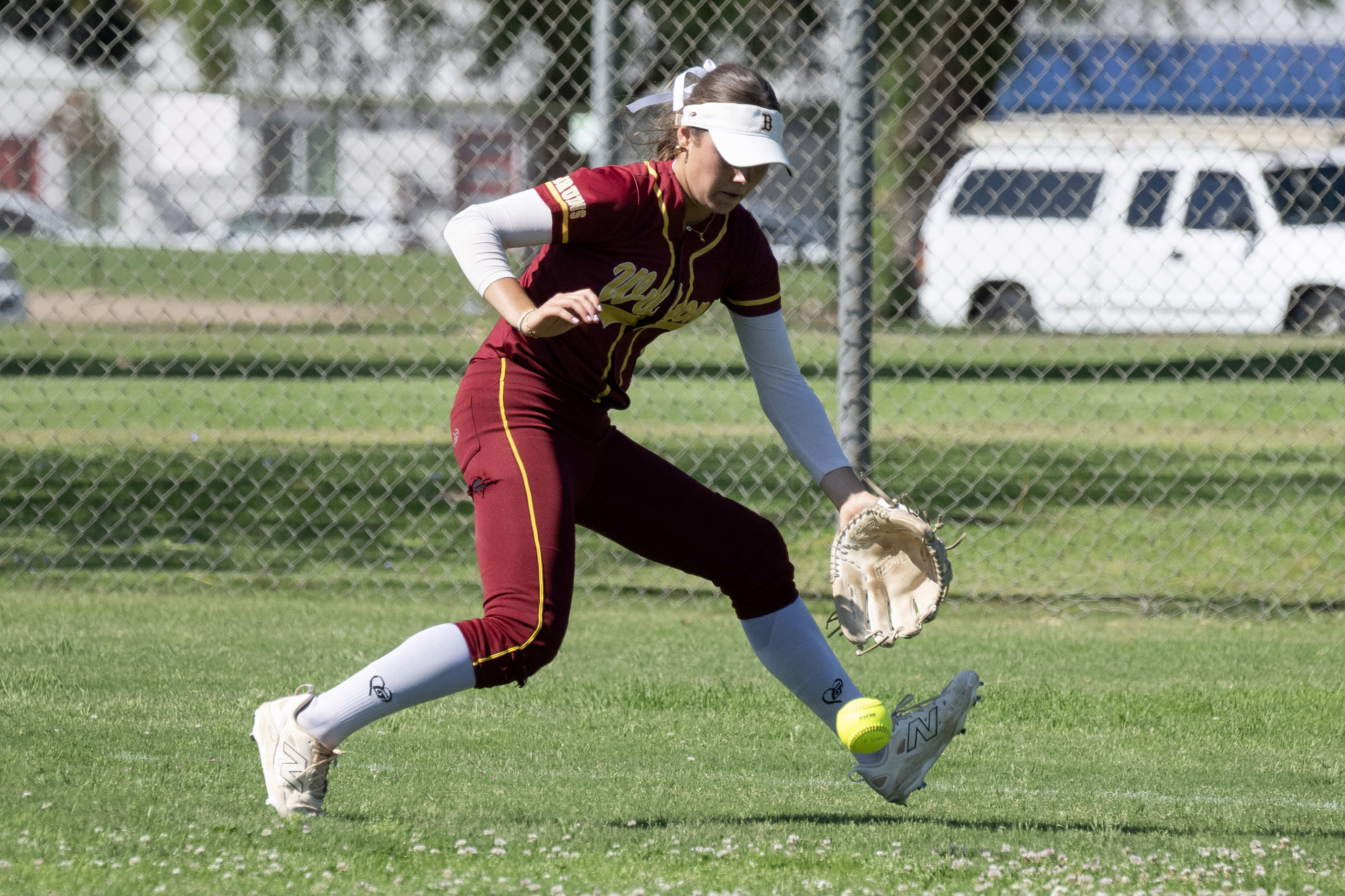 Wilsonâs Charlotte White stops a ground ball during a Moore...