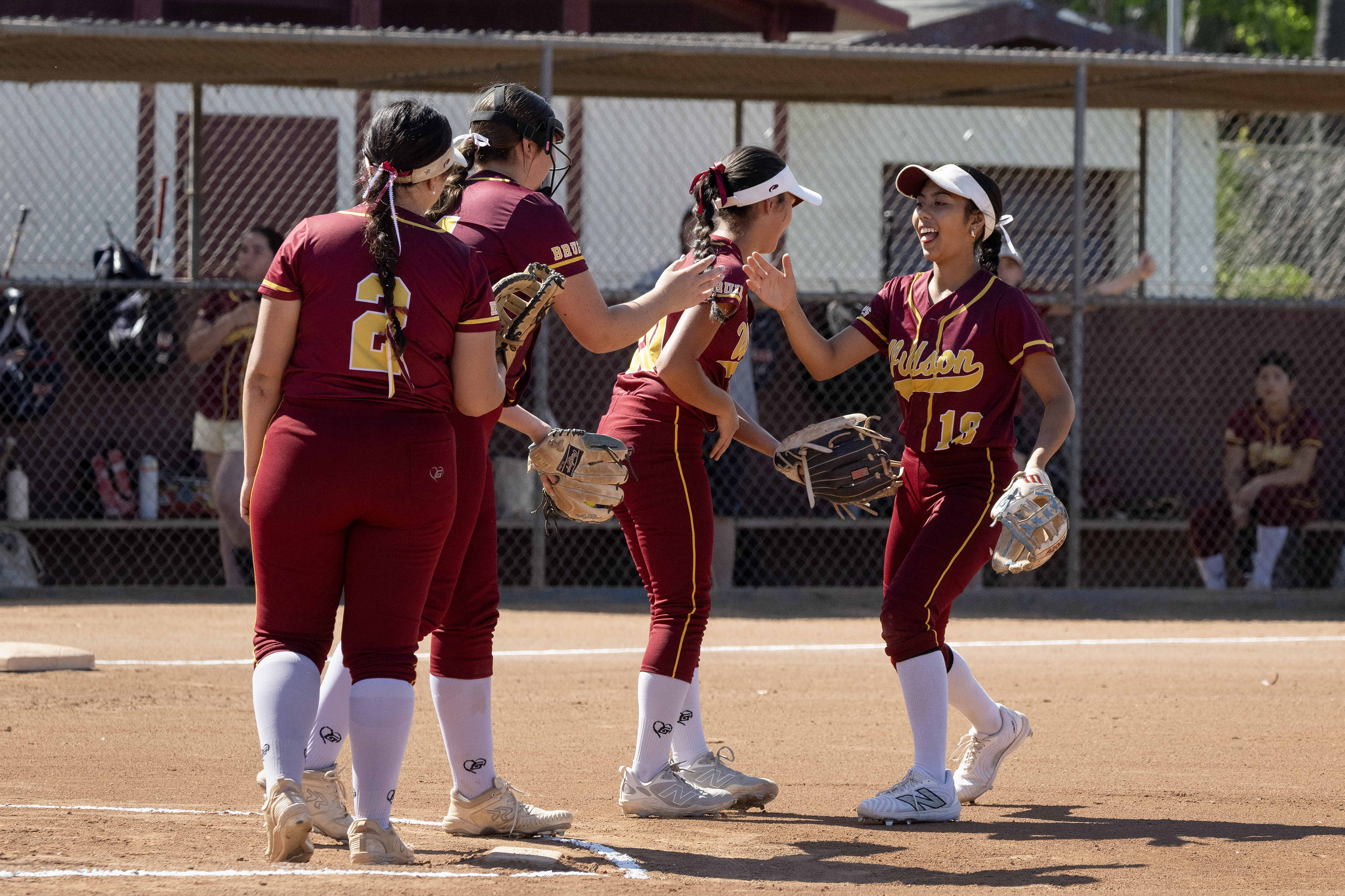 Wilsonâs Sacha Zalamea, right, celebrates after making an out against...