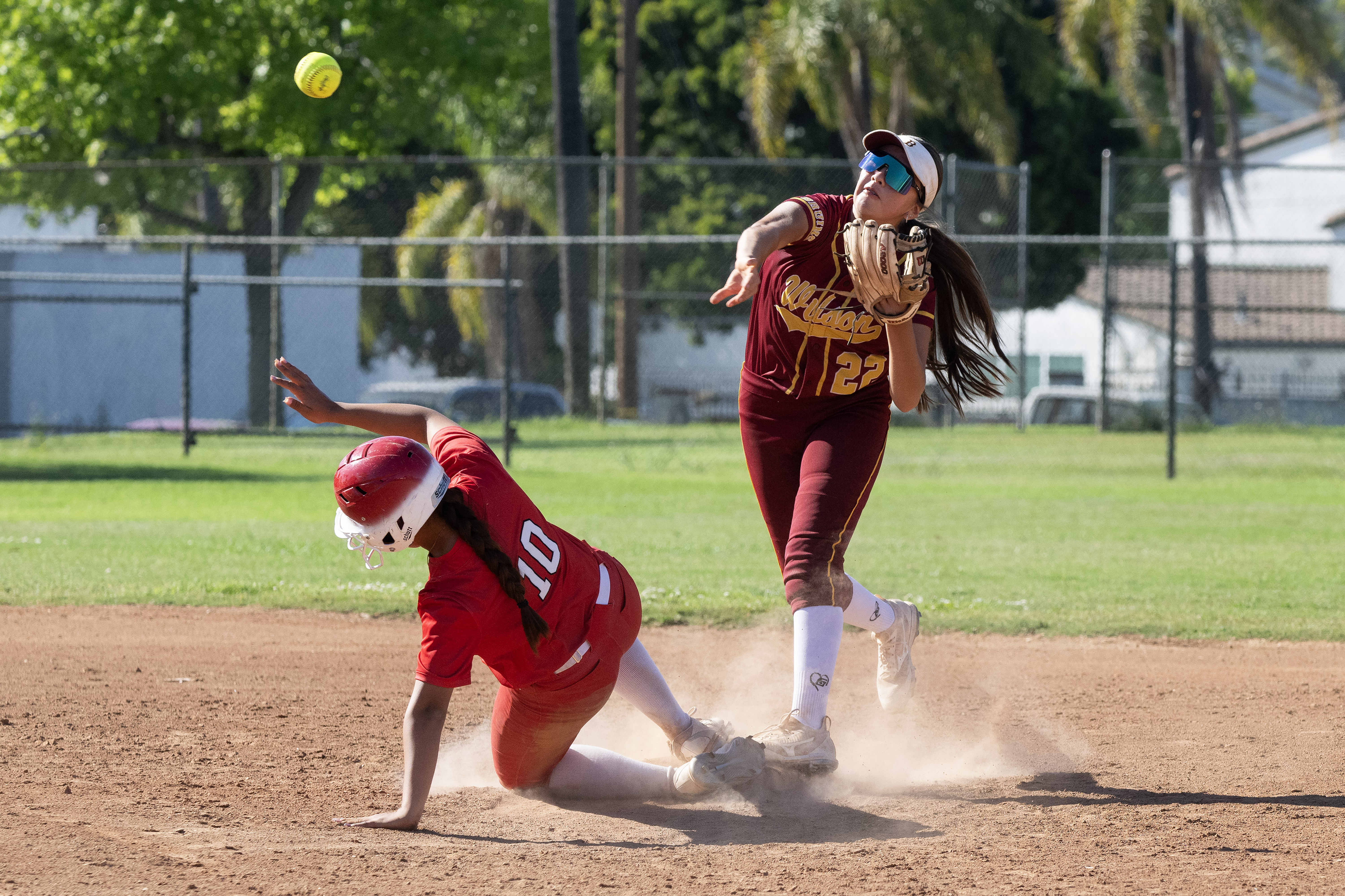 Wilsonâs Giselle Joaquin makes the out at second and throws...