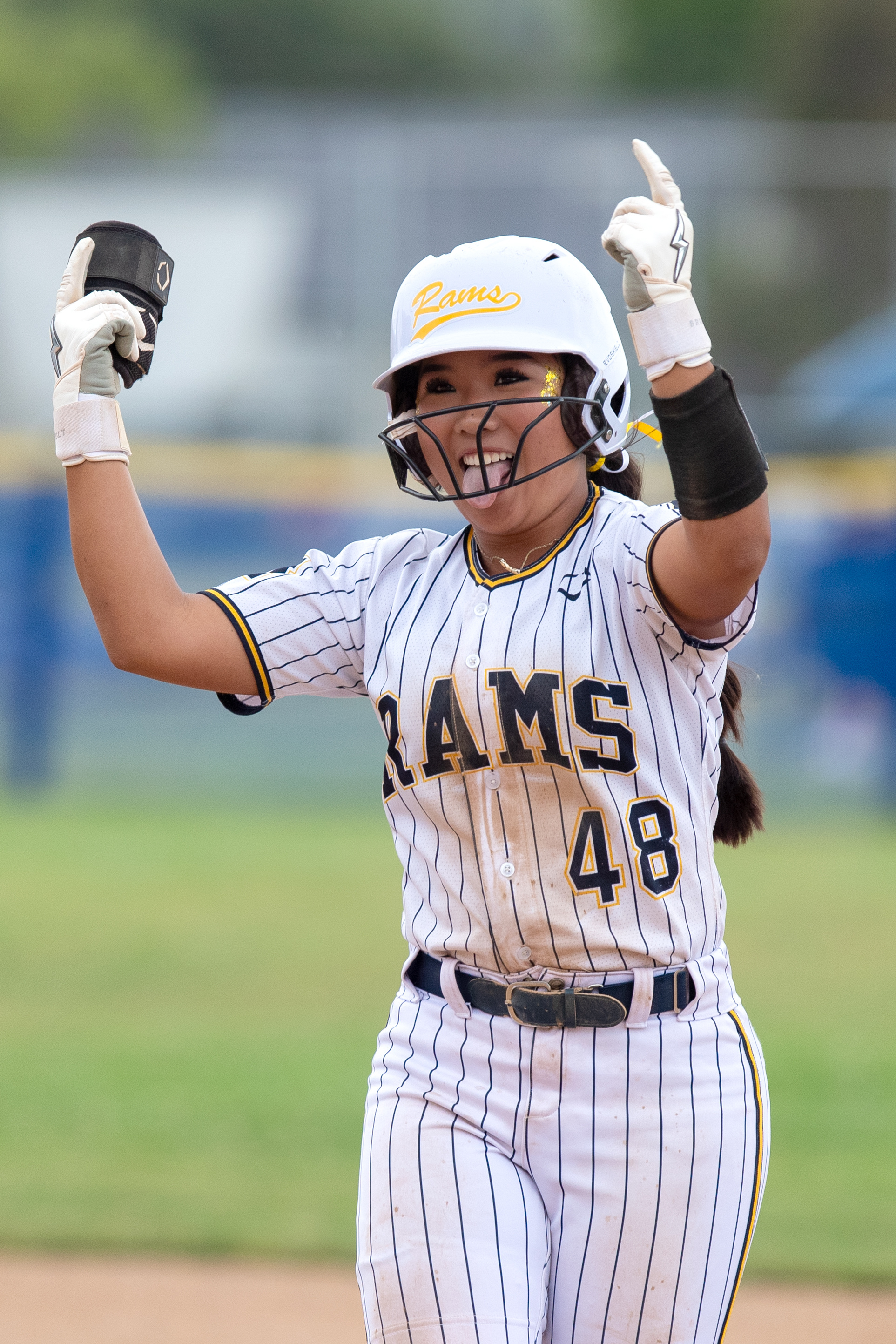 Millikanâs Lauryn Kim reacts after hitting a double against Long...