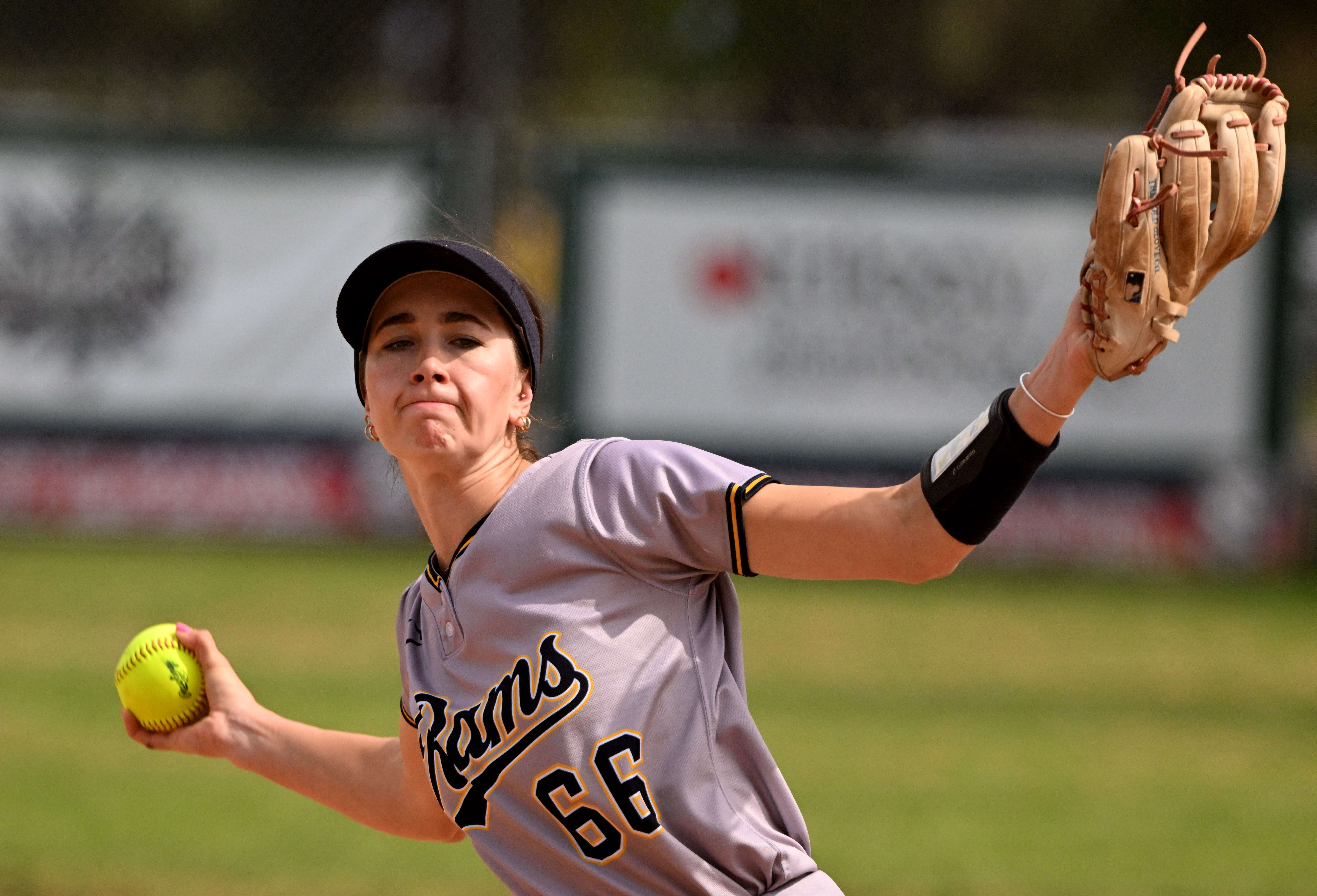 Starting pitcher Riley McAndrew #66 of the Millikan Rams throws...