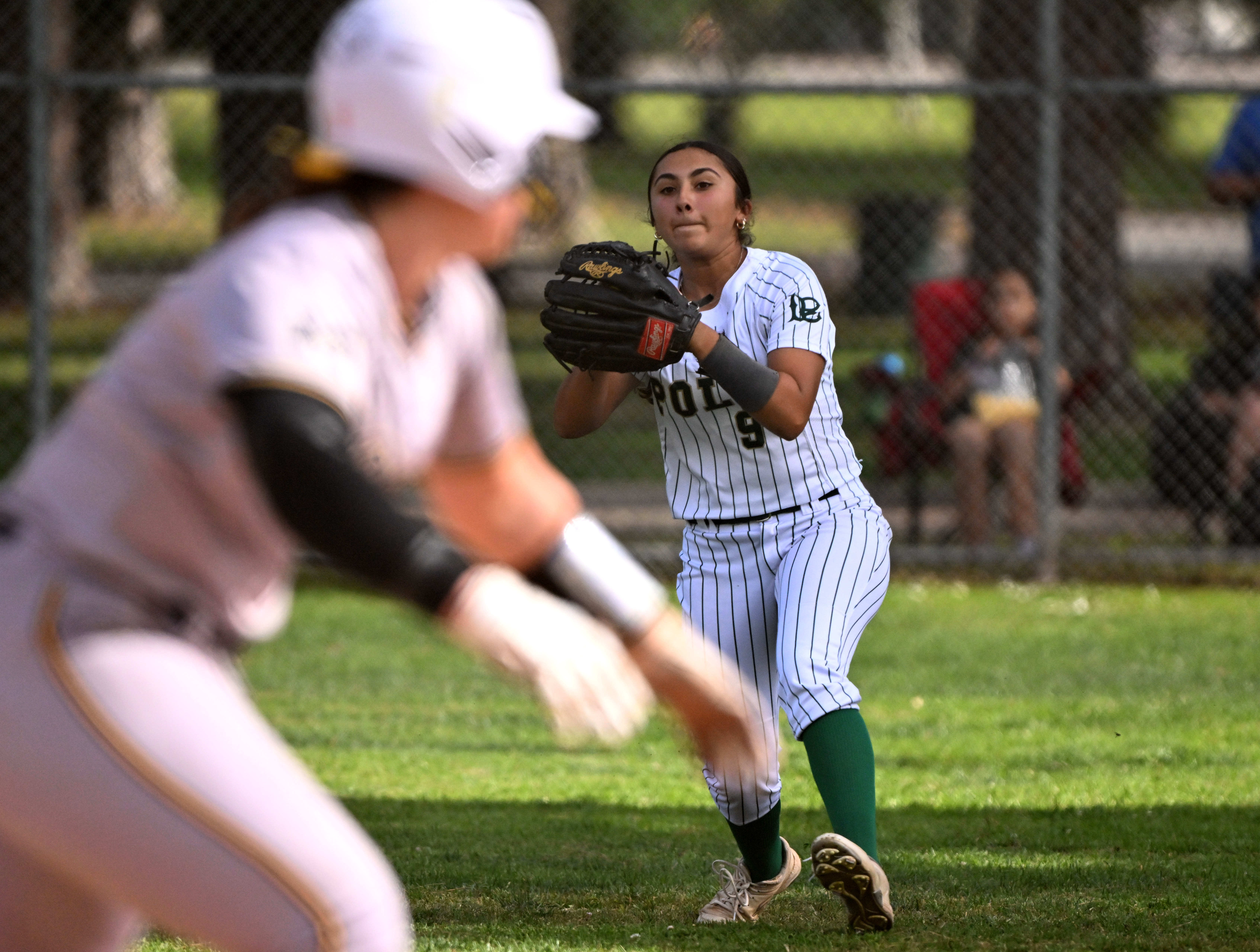 Right fielder Elizabeth Marquez #9 of the Long Beach Poly...