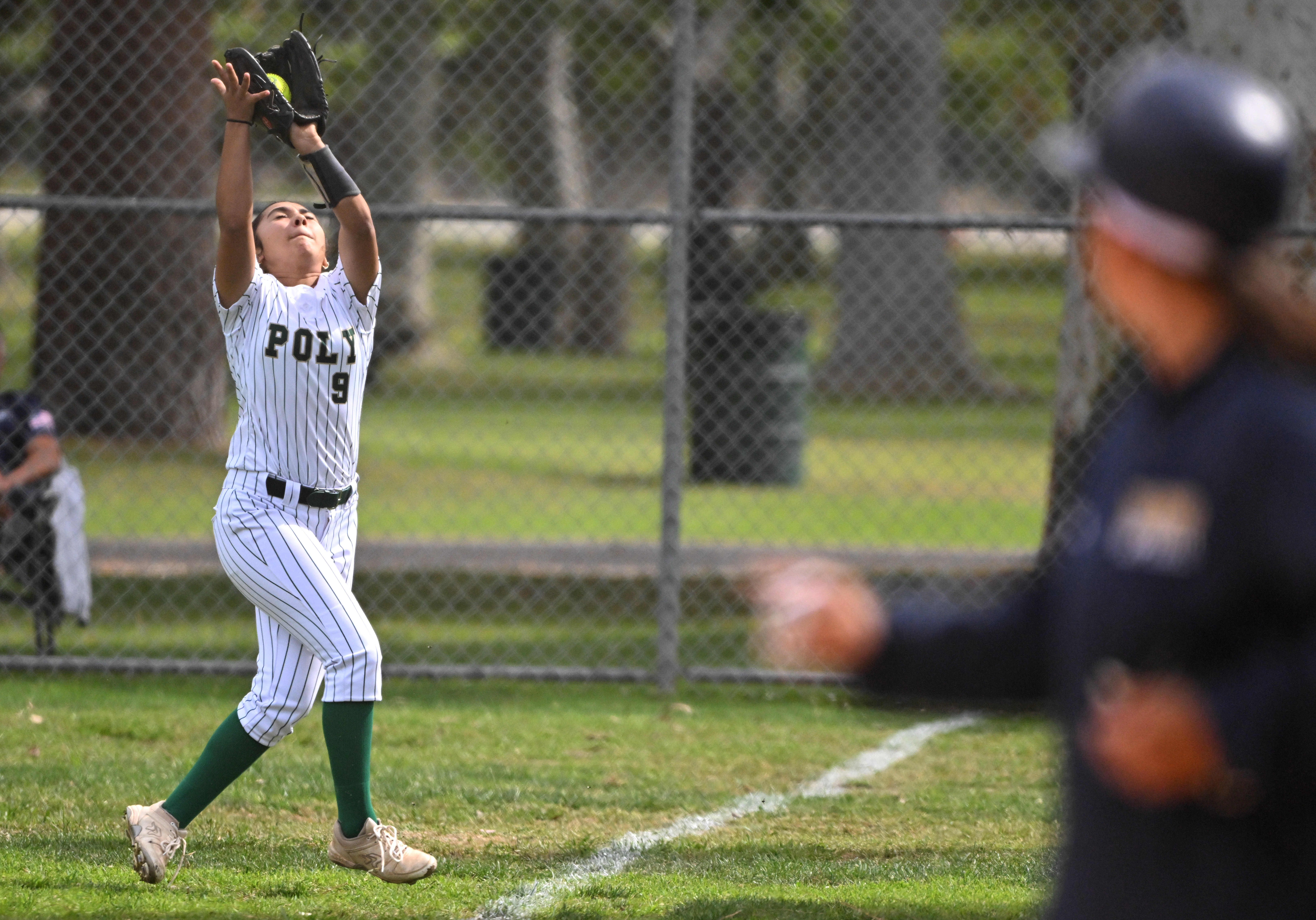 Right fielder Elizabeth Marquez #9 of the Long Beach Poly...