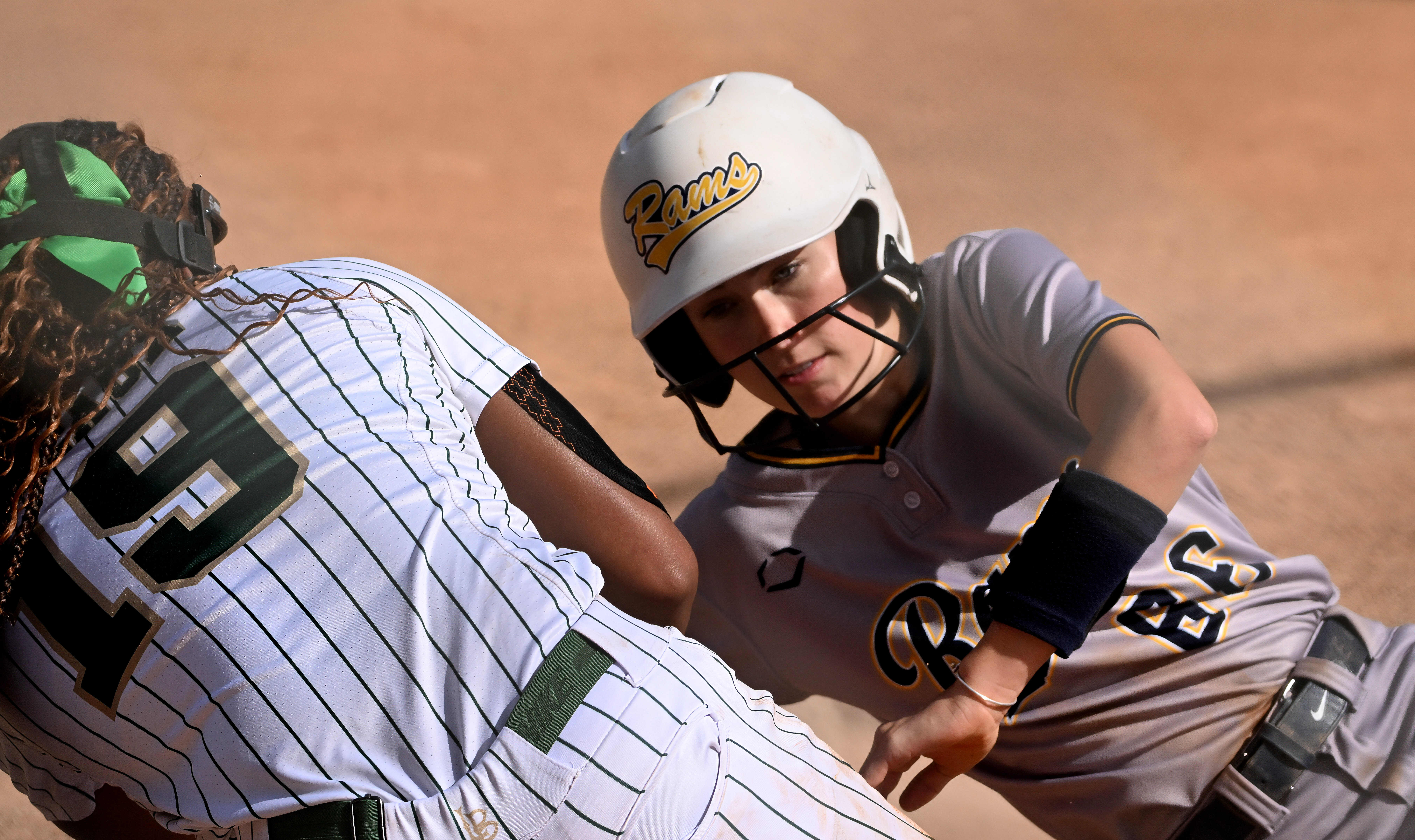 Riley McAndrew #66 of the Millikan Rams scores ahead of...