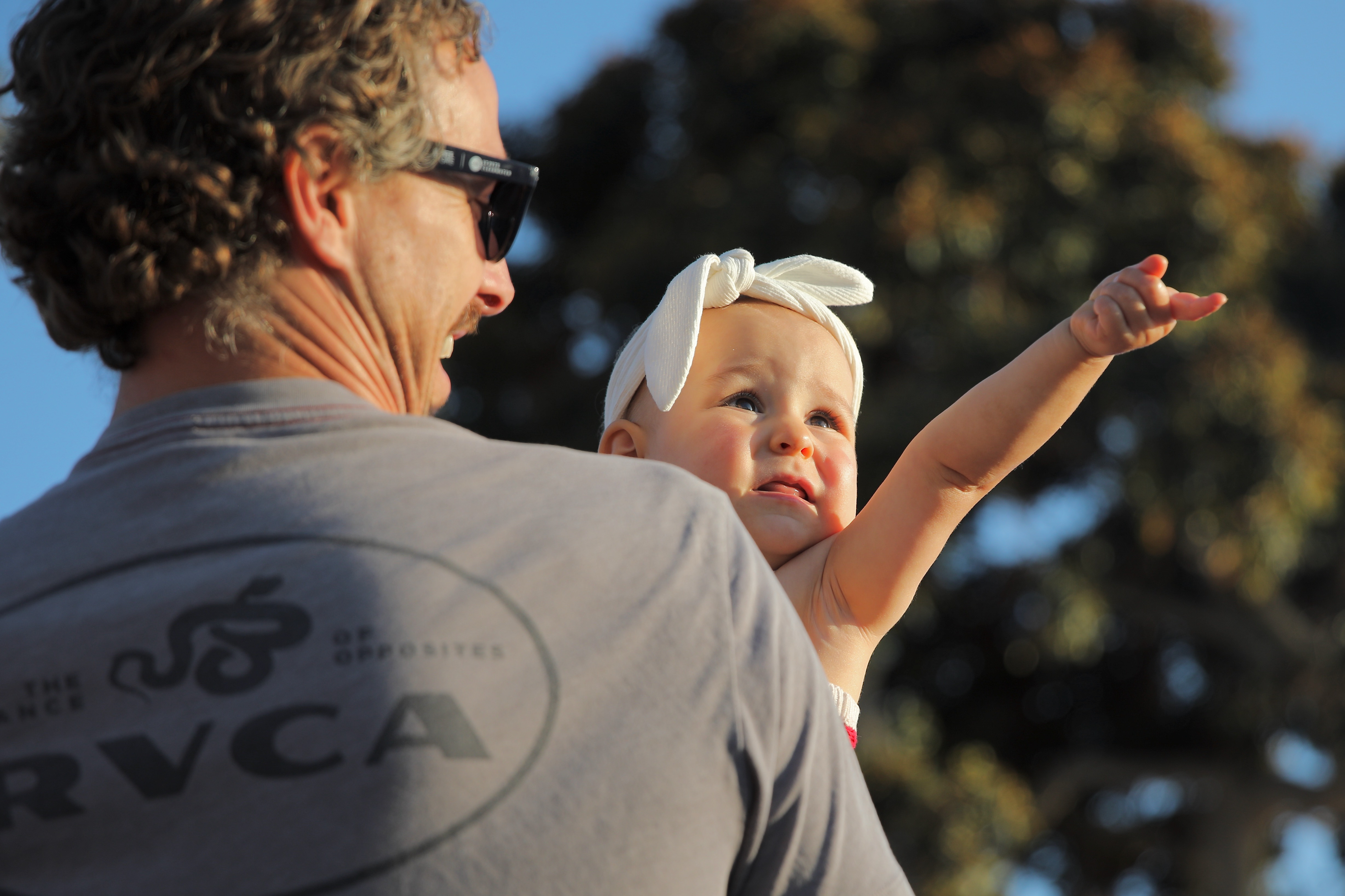 A youngster notices a paraglider fling over the Big Bang...