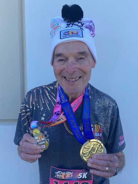 Tom Pontac, showing some finisher medals, ran in over 400...