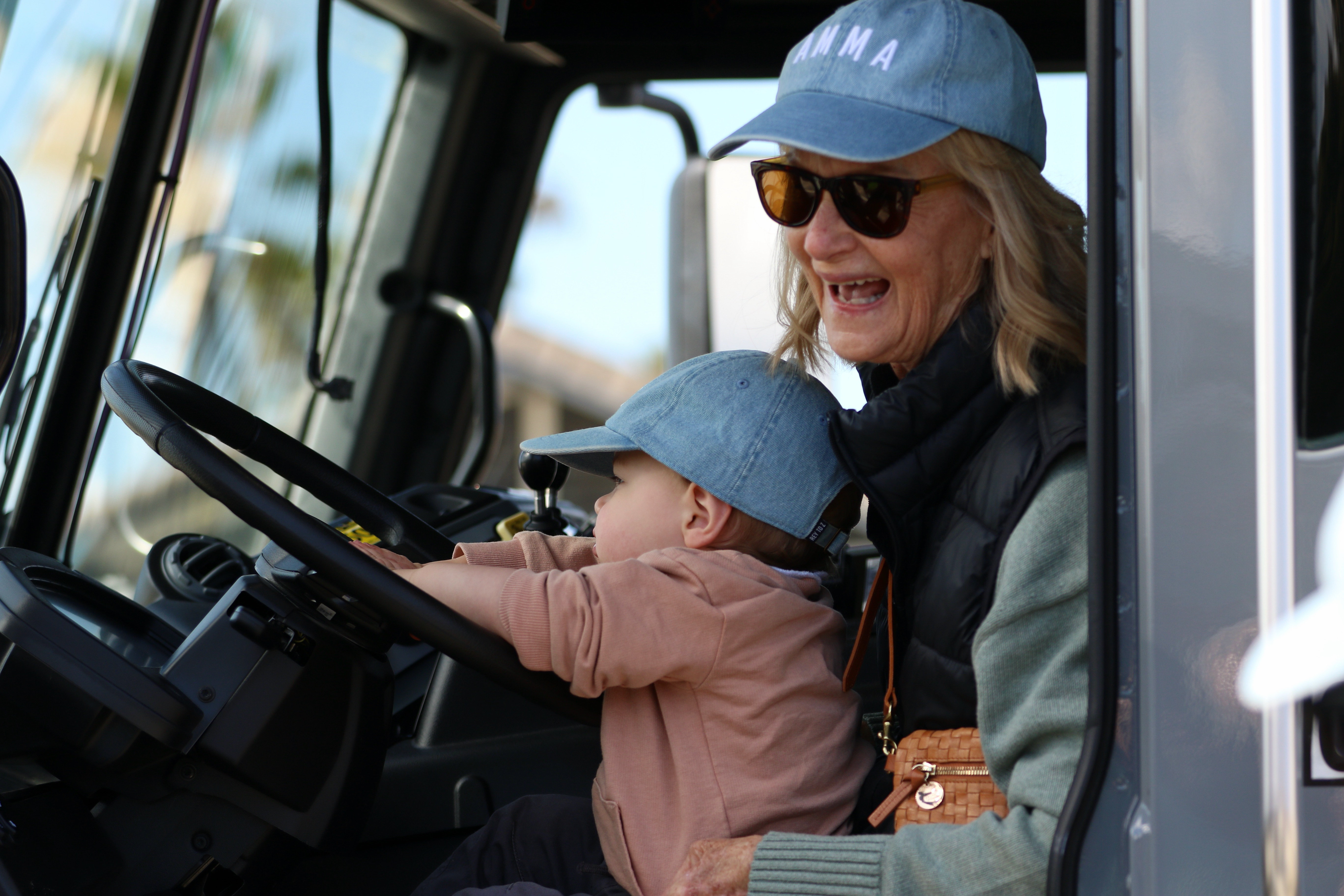 Becky Rappe of Long Beach reacts as her grandson, Axel,...