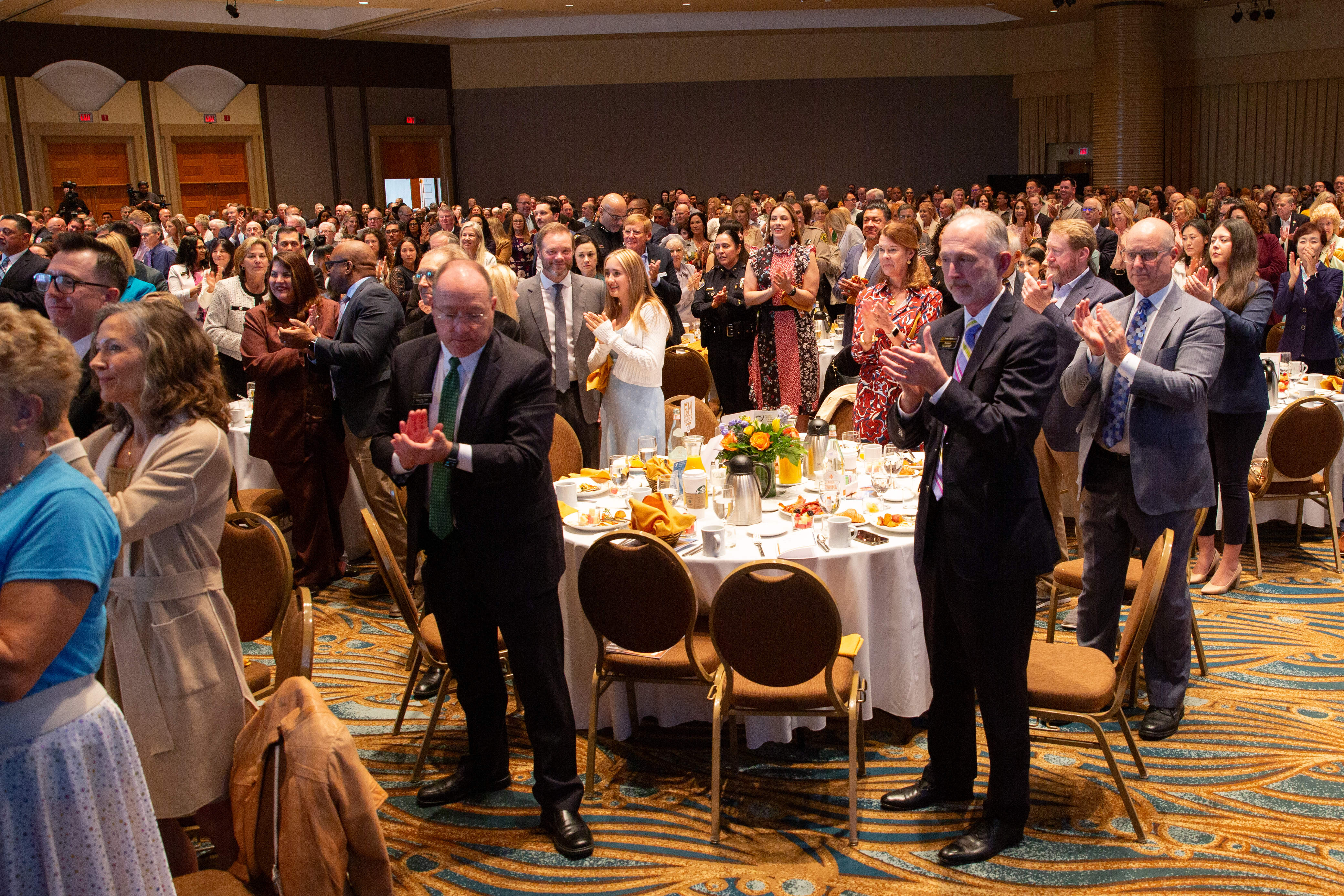 Attendees applaud during the YMCA’s 58th Annual Good Friday Breakfast...