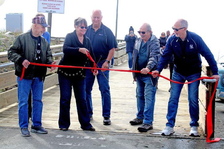 Buoyant at the boardwalk: LB celebrates reopening of local landmark
