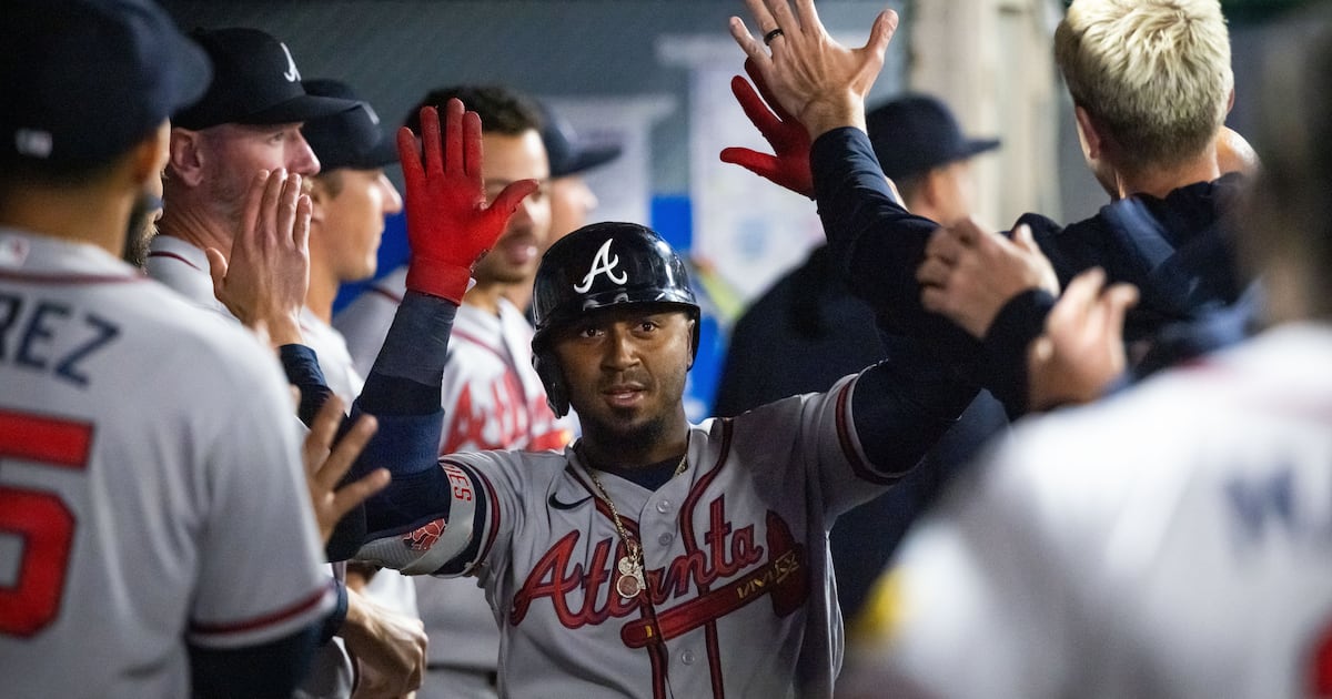 Ozzie Albies hits his 3rd home run and Braves beat Angels following a bench-clearing brawl