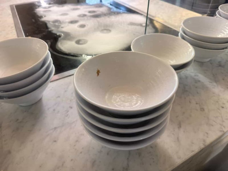 A bowl with leftover food on it, out for students to eat with at the USC Village Dining Hall.