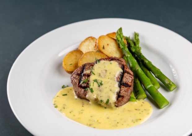 Lighthouse Bar & Grill's center-cut filet mignon with béarnaise sauce, asparagus and potatoes. (Photo by Matt Spinetta/Prismic Photography)