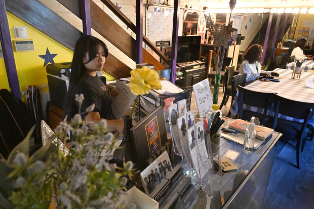 Sherine Agbulos, a staffer at Performing Stars of Marin, left, and Felecia Gaston, its executive director, work at the nonprofit's office in Marin City, Calif., on Friday, April 3, 2026. The organization is among local nonprofits receiving funding to benefit residents of Marin City public housing. (Alan Dep/Marin Independent Journal)