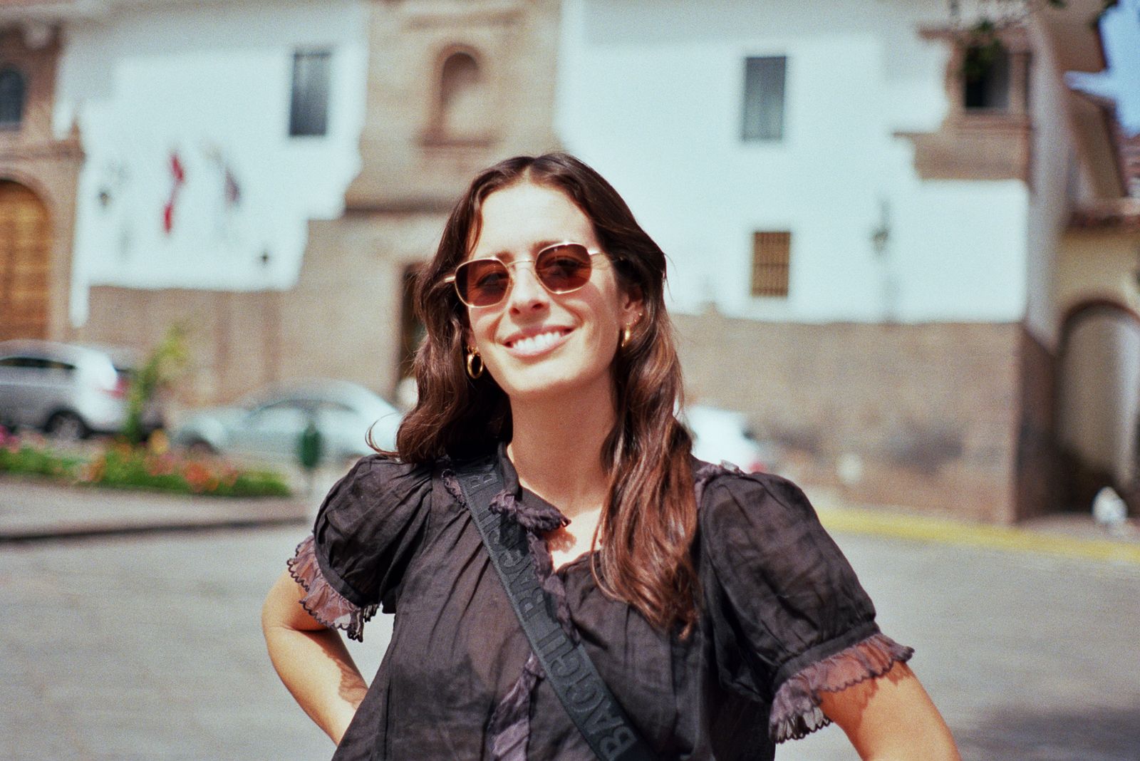 Image may contain Face Head Person Photography Portrait Blouse Clothing Accessories Sunglasses Happy and Smile