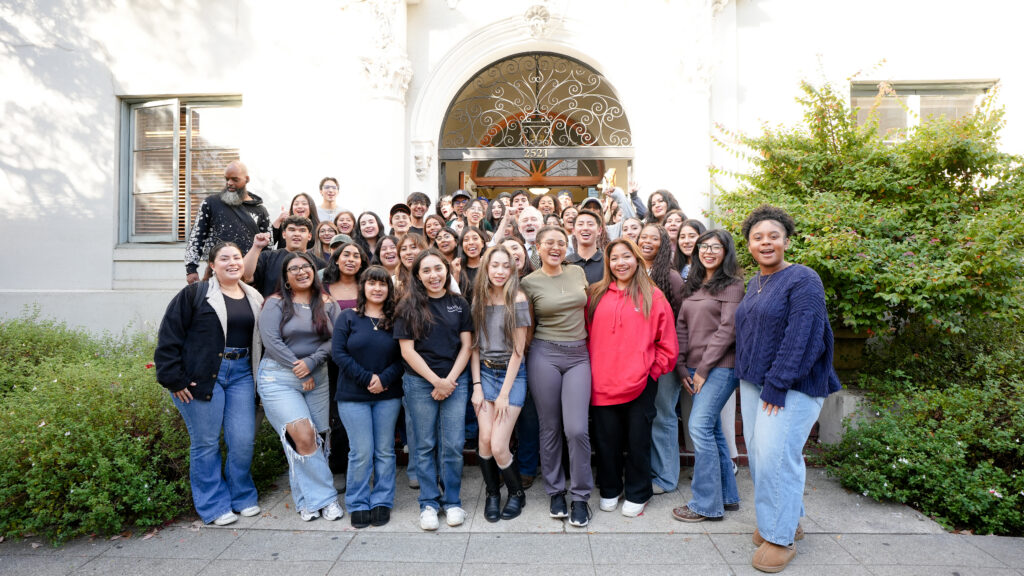 Tanioka, Chancellor Rich Lyons, and a group of dozens of students pose for a group photo