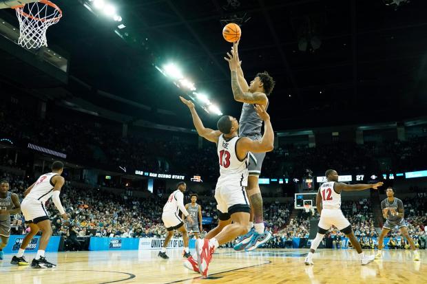 UAB forward Yaxel Lendeborg shoots over SDSU's Jaedon LeDee in the first round of the 2024 NCAA Tournament in Spokane, Wash. (AP Photo/Ted S. Warren)