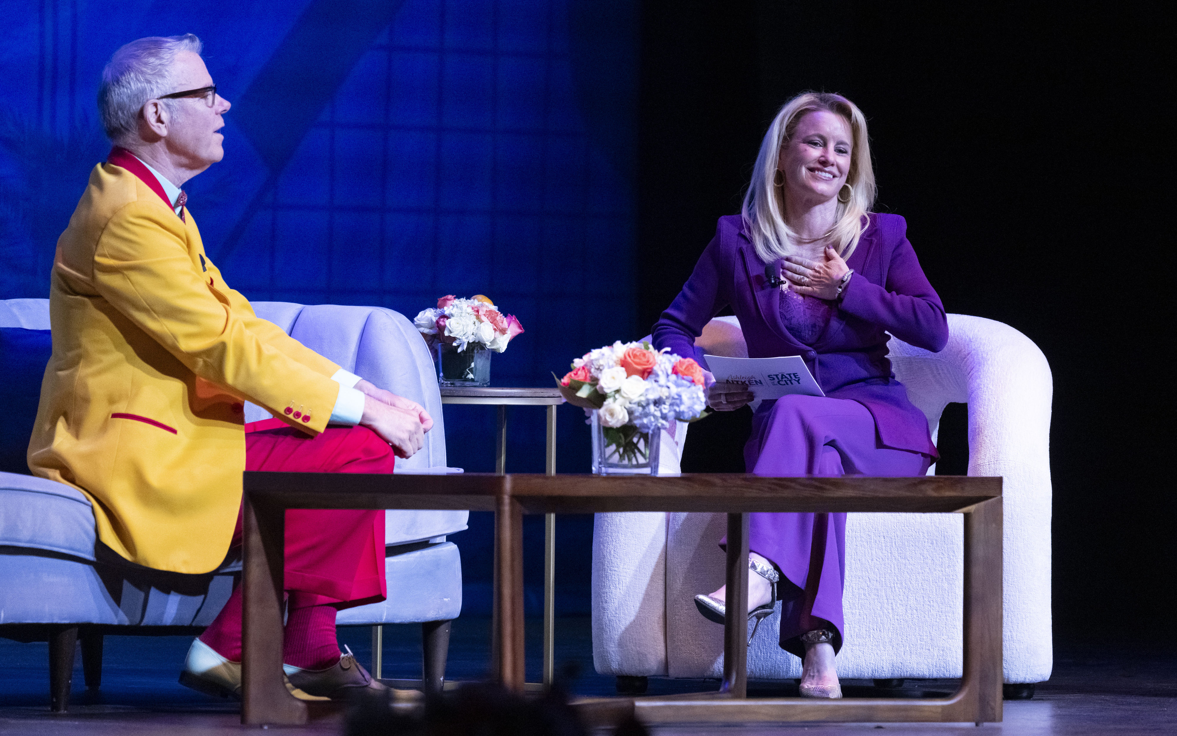 Anaheim Mayor Ashleigh Aitken talks with humorist Charles Phoenix during...
