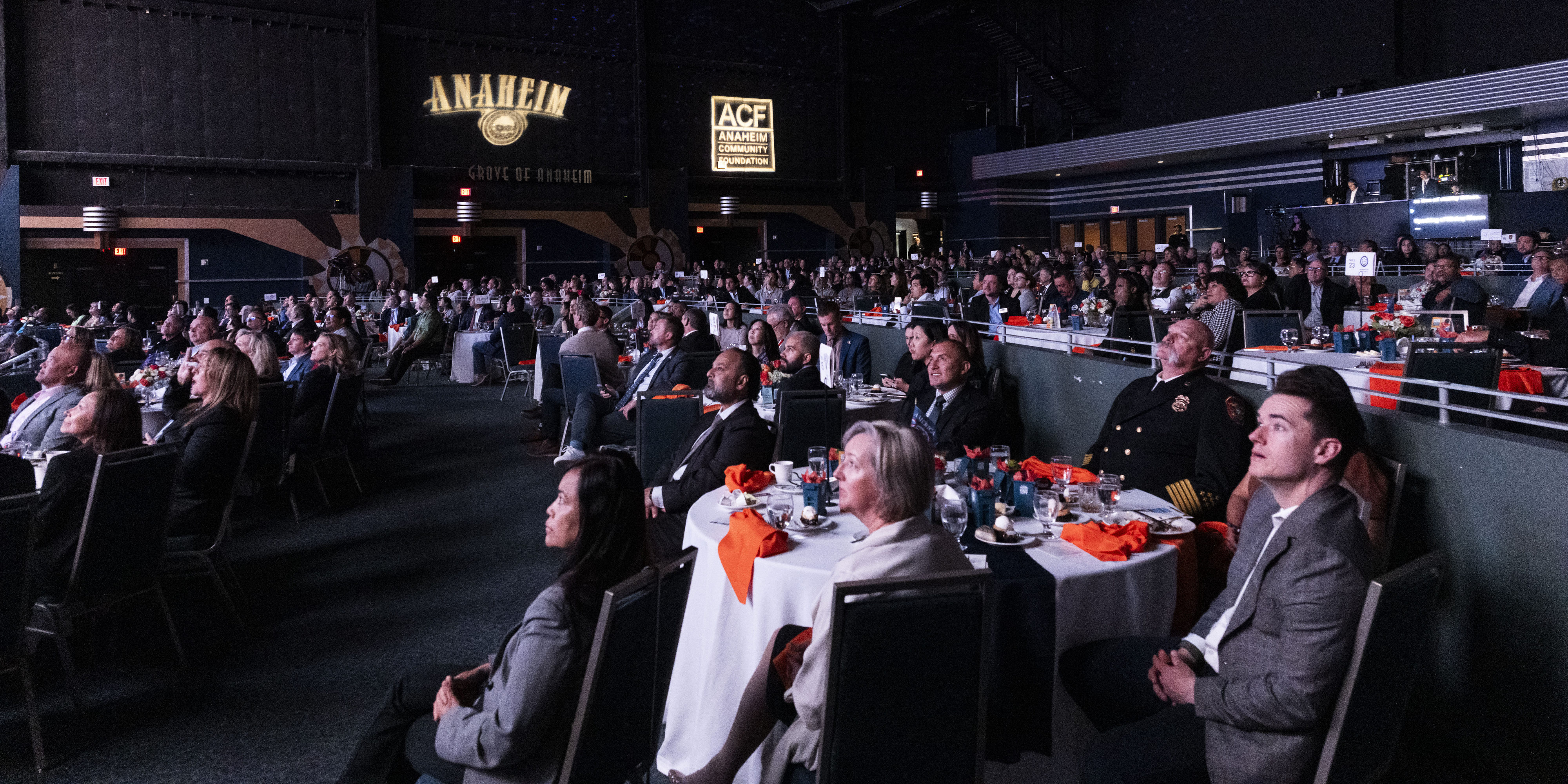 Audience members listen during the State of the City event...