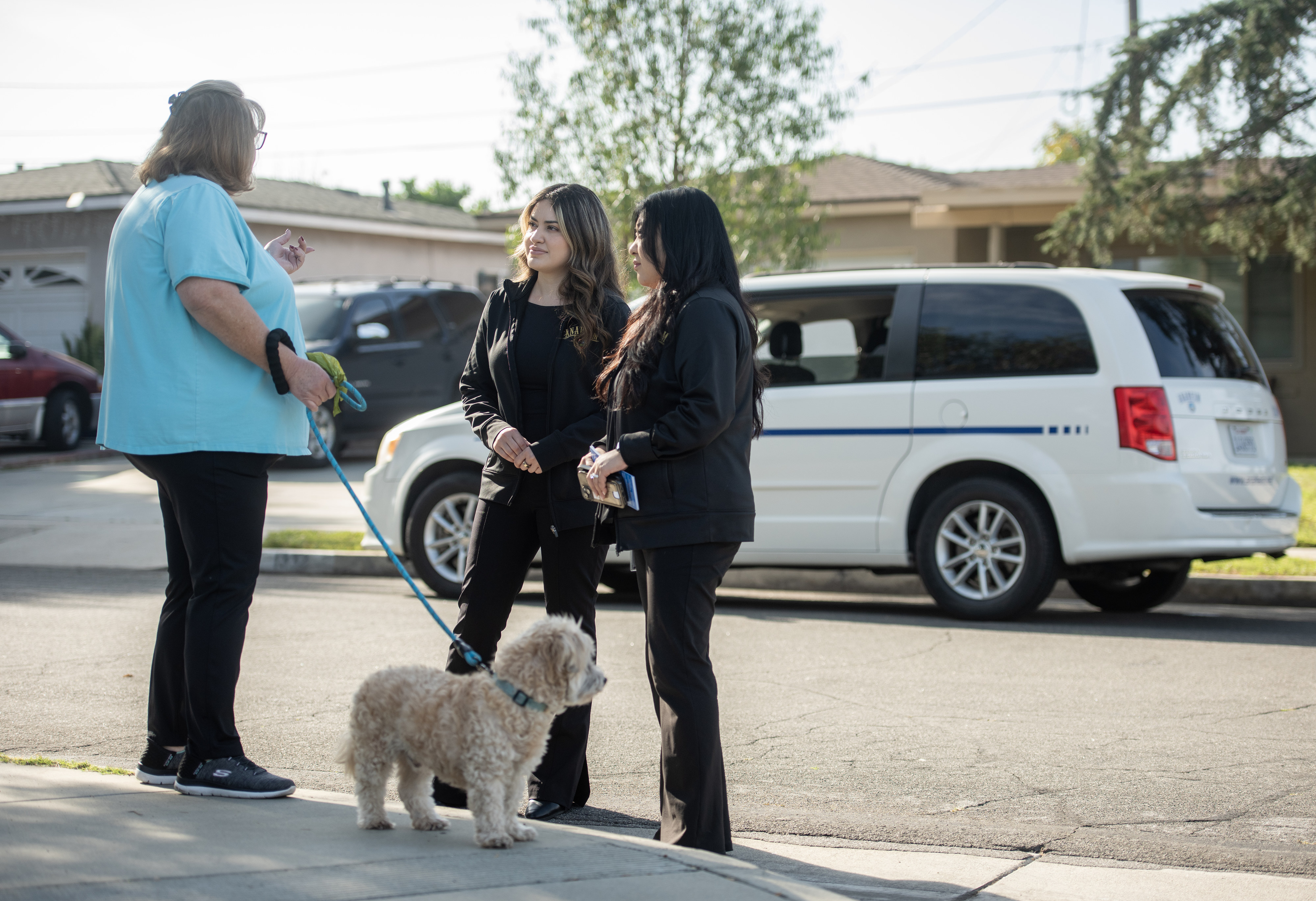 City of Anaheim Communications Specialists Esther Kwon, right, and Natalie...