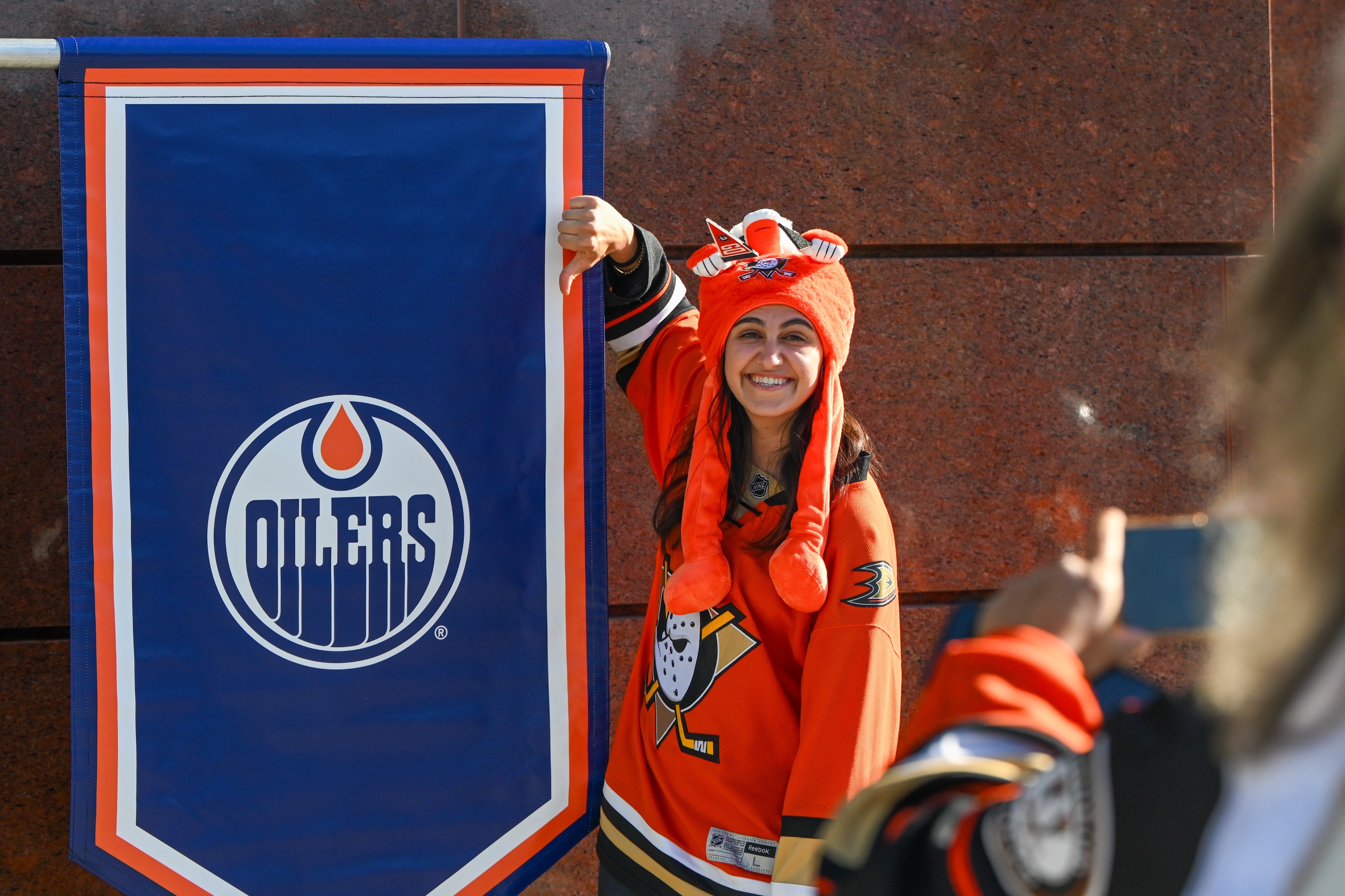 Ducks fan Yalda Chalabi gives the Oilers a thumbs down...