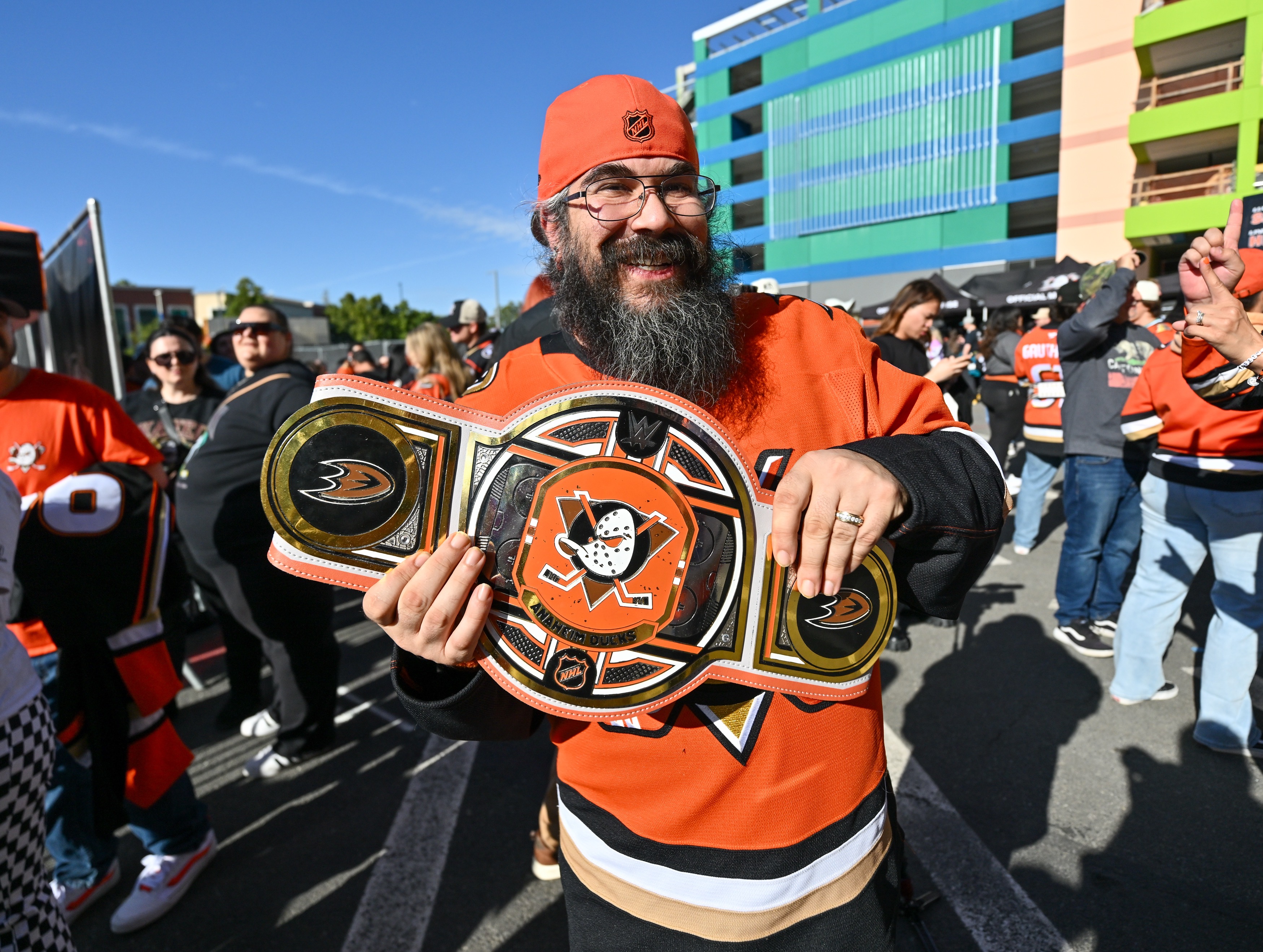 John Polter shows off his championship belt before the Ducks...