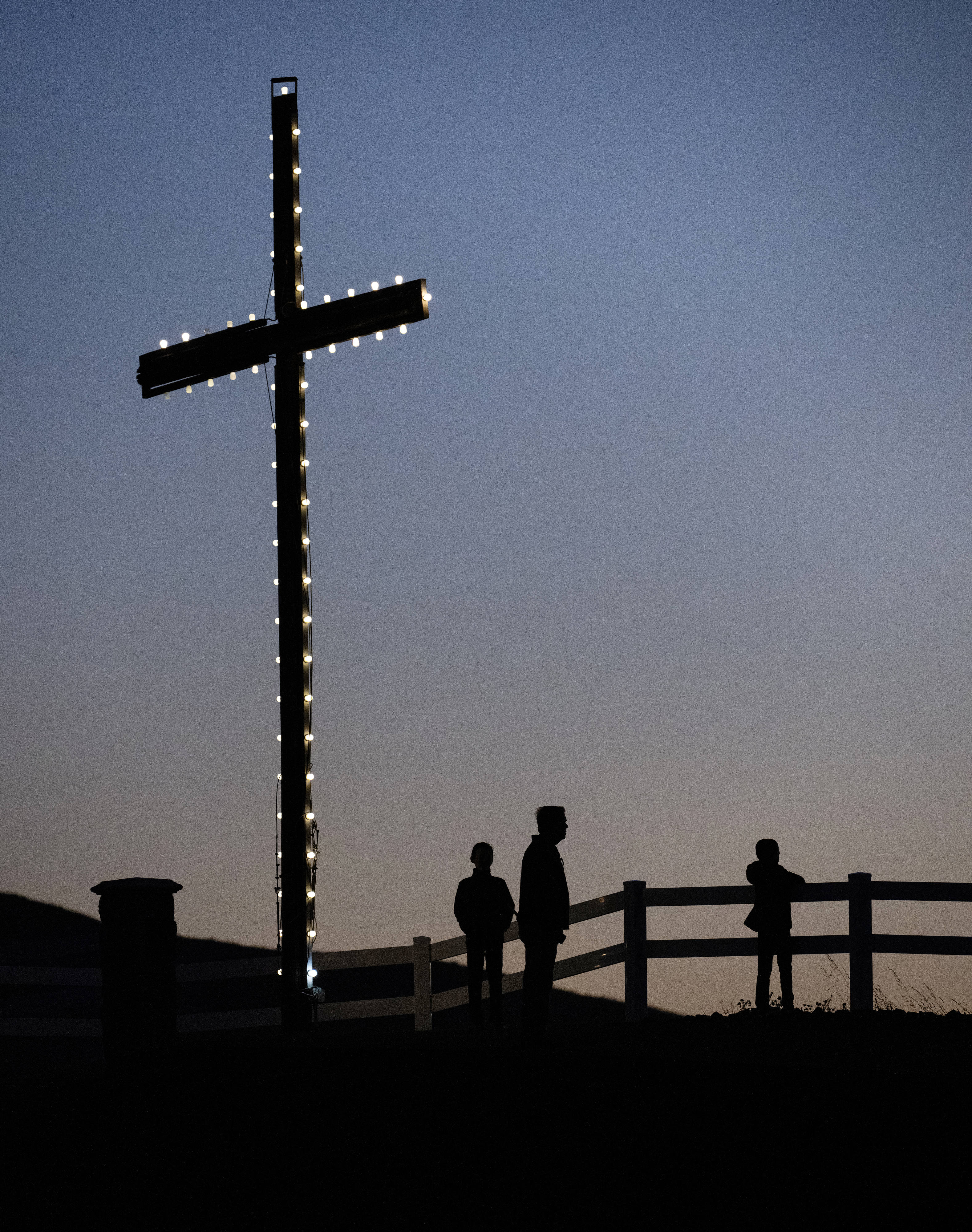 The sun rises over Kindred Churchâs iconic cross during Easter...