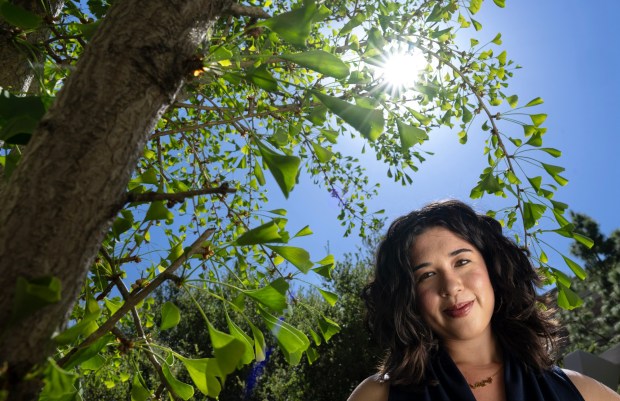 Chapman University student Ashley Agatep is the lead author of a study that found Los Angeles parks in lower socioeconomic areas are 15 degrees hotter because of fewer trees and available shade. She is pictured at the university in Orange on Wednesday, April 8, 2026. (Photo by Mindy Schauer, Orange County Register/SCNG)