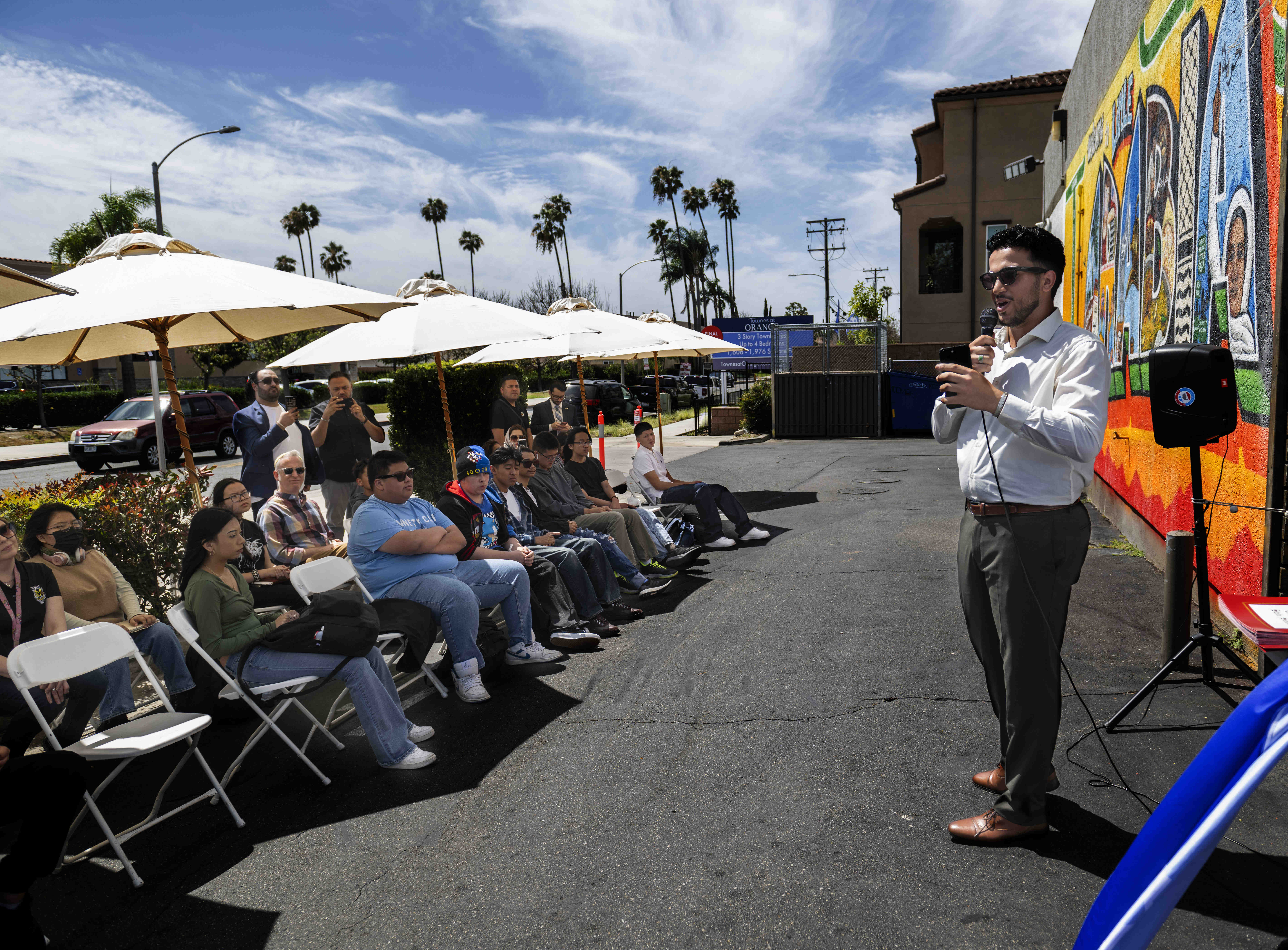 Muntadhar Aljadeed of the Arab American Civic Council addresses those...
