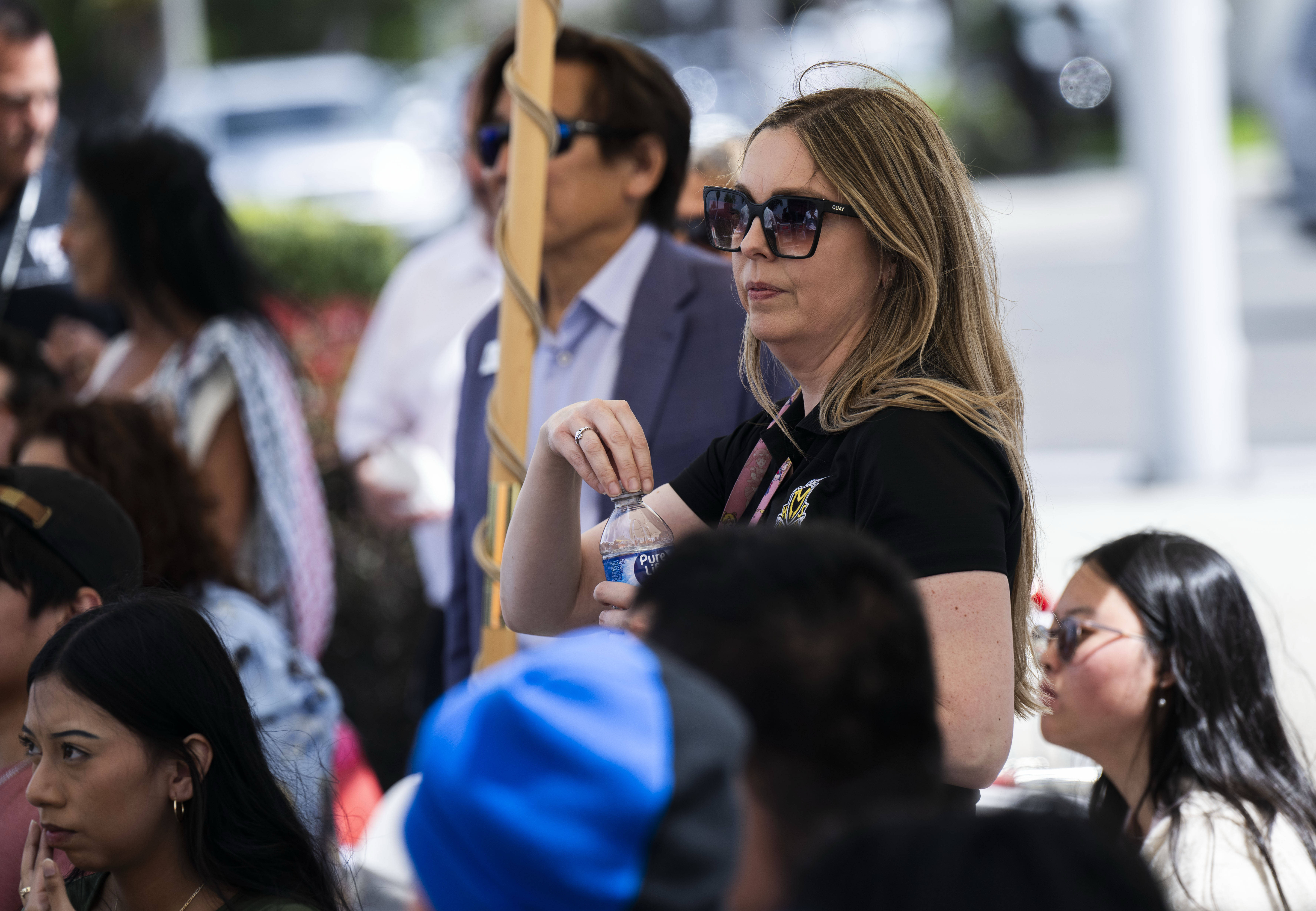 Magnolia High School art teacher Vanessa Fogelquist listens during a...