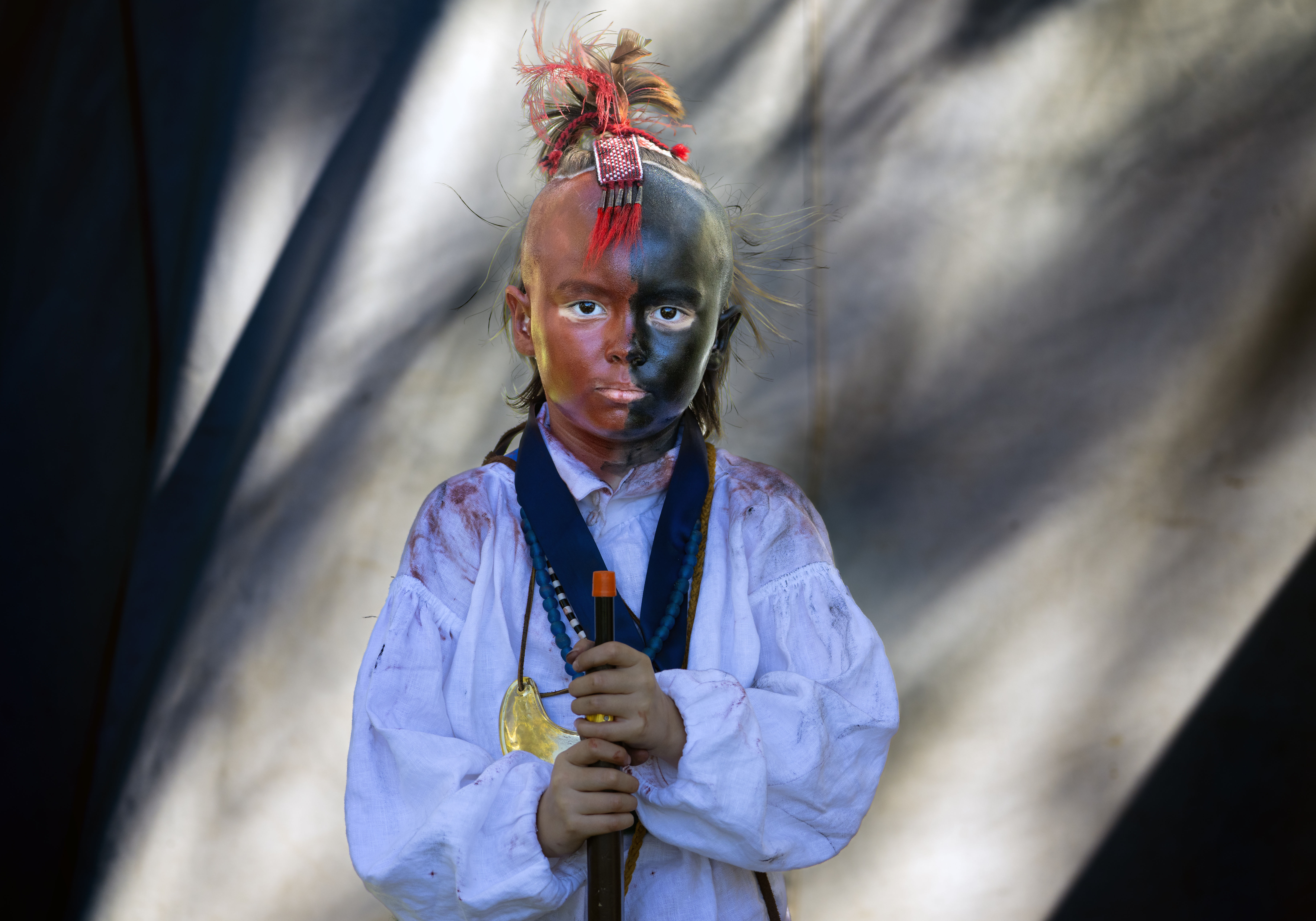 Seven-year-old Sean Huerta dresses like a member of the Indigenous...