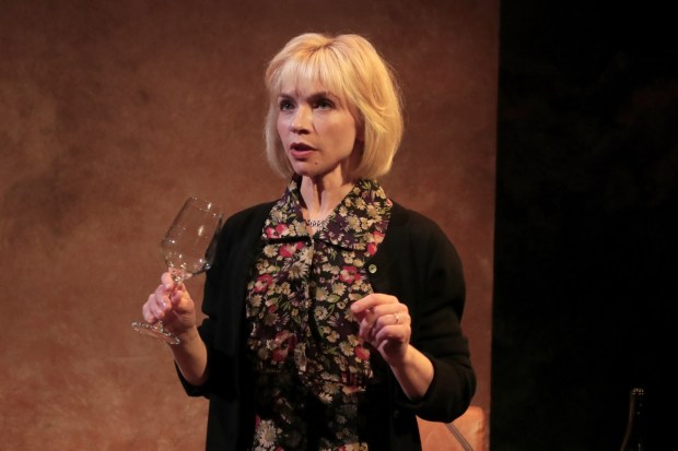 Rofi Flynn plays Angela, a mother who objects to her daughter's middle-school math teacher telling students about the Holocaust in "The Messenger" at Chance Theater in Anaheim. (Photo by Doug Catiller)
