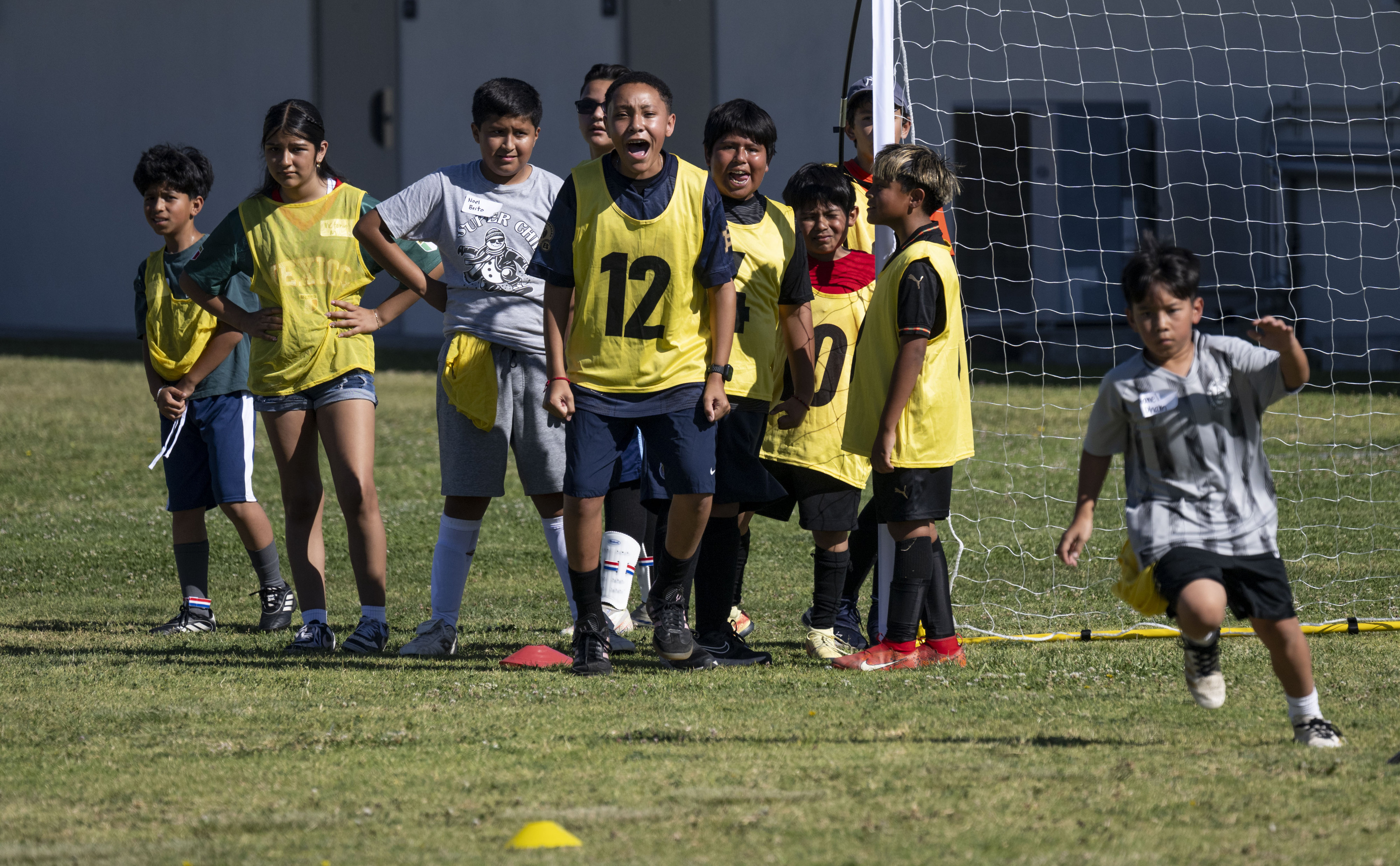 Students cheer on the ir teammates during a OC GRIP...